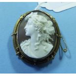 A cameo brooch, carved a portrait of a l