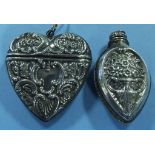 A silver heart shaped box, and another s