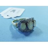 A 9ct gold, opal and diamond ring