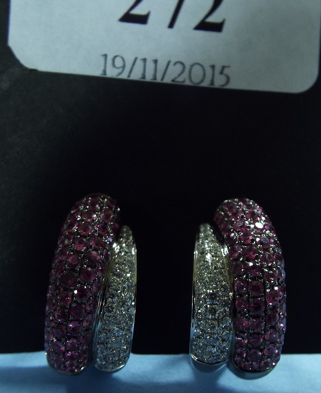 A pair of 18ct white gold, pink sapphire