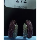 A pair of 18ct white gold, pink sapphire