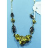 A gold and hematite necklace, the hemati