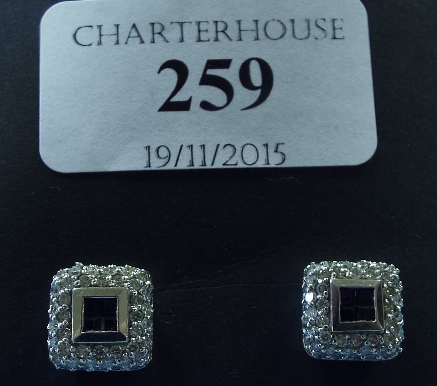 A pair of 14ct white gold, sapphire and