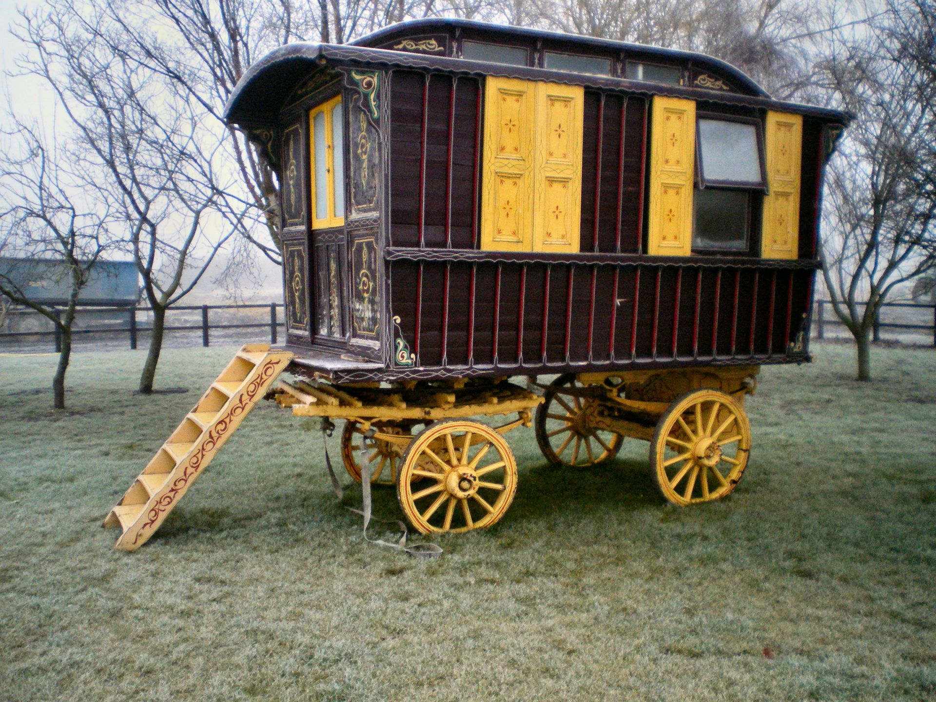 Showmans living wagon of late 19th century style with Mollycroft type roof and decorative finish