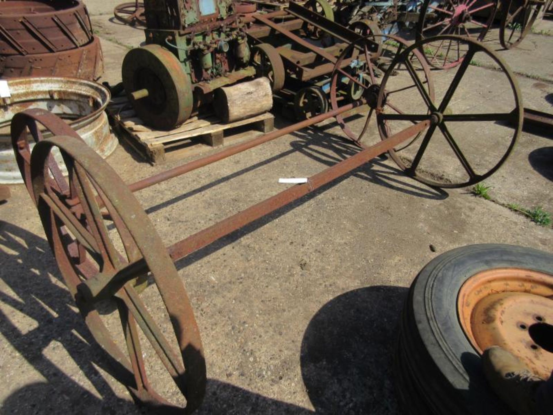 2no. iron wheels and axle