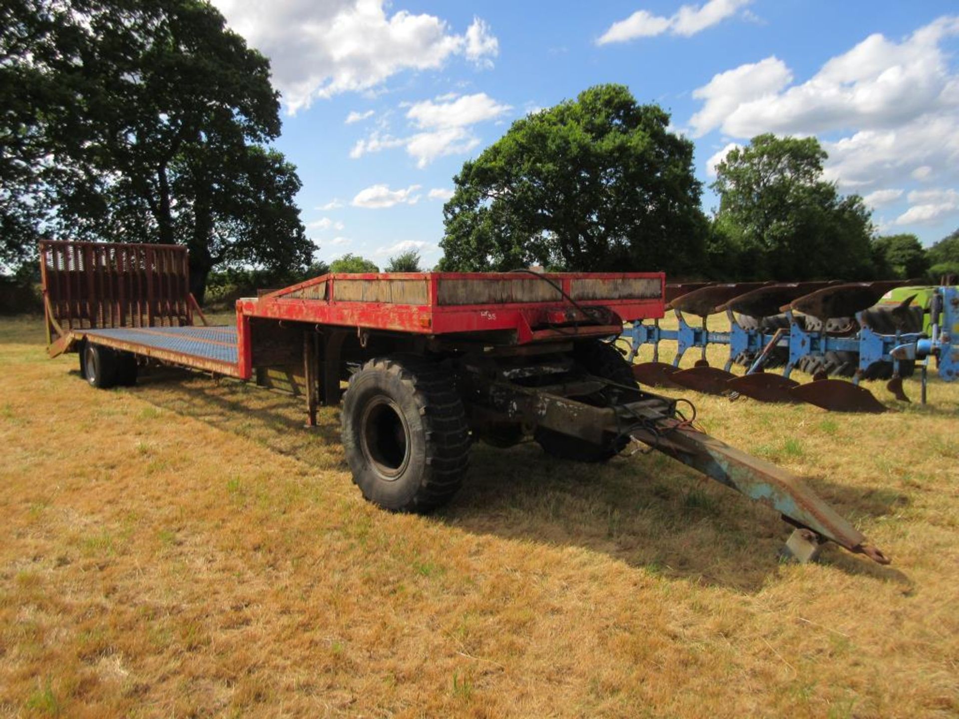 Taskers single axle, step frame, beaver tail low loader trailer