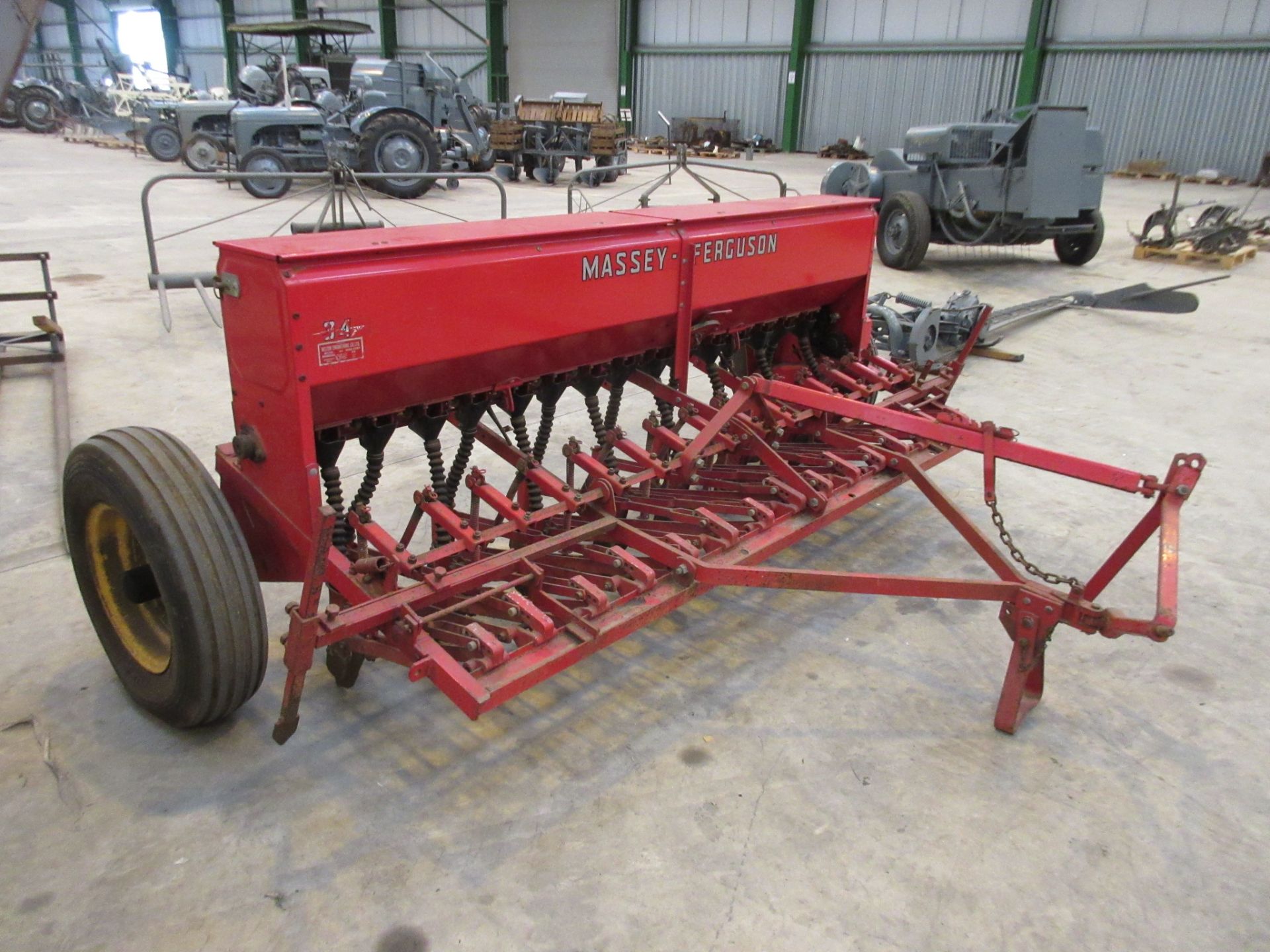 Massey Ferguson 34-7 trailed drill in very good original ex-farm condition with bout markers.