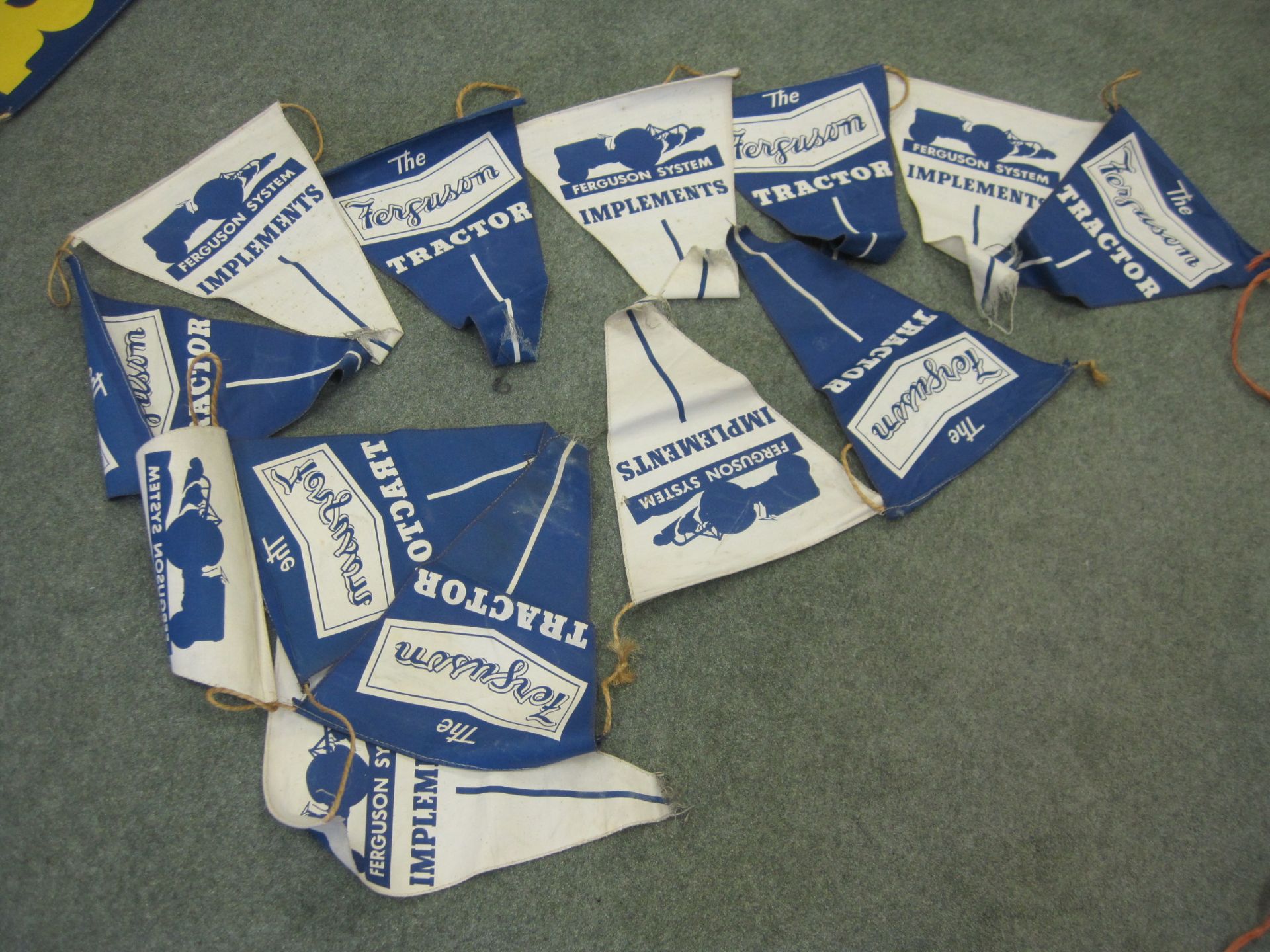A quantity of dealership bunting consisting of 13no. alternating fabric pennants depicting the
