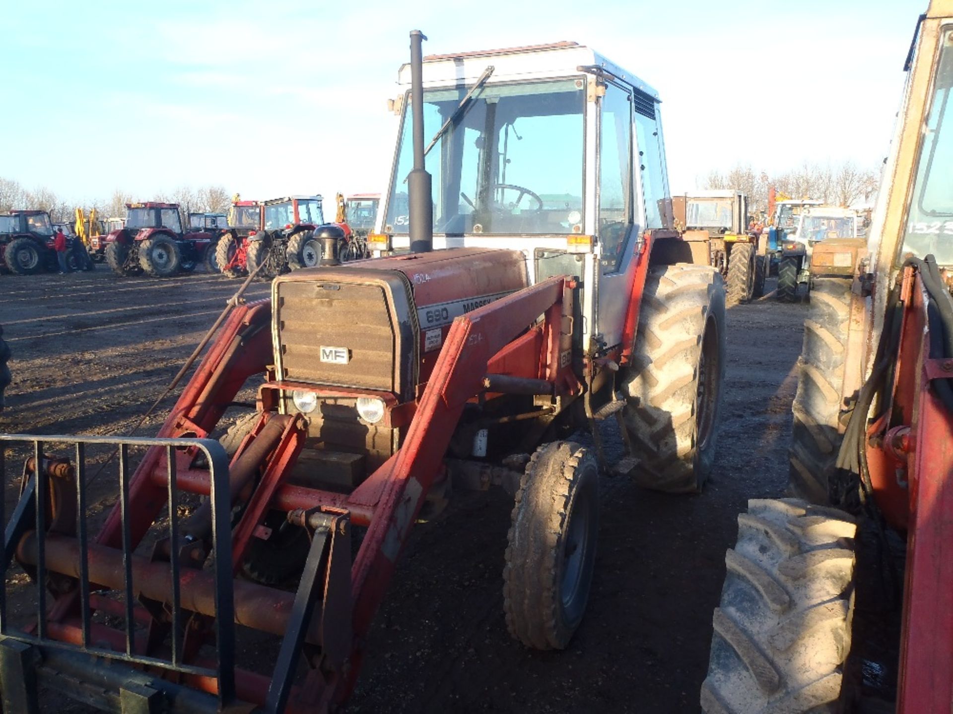 Massey Ferguson 690 2wd Tractor with Loader & Forks. 2550 Hrs. Reg No. SMO 725Y