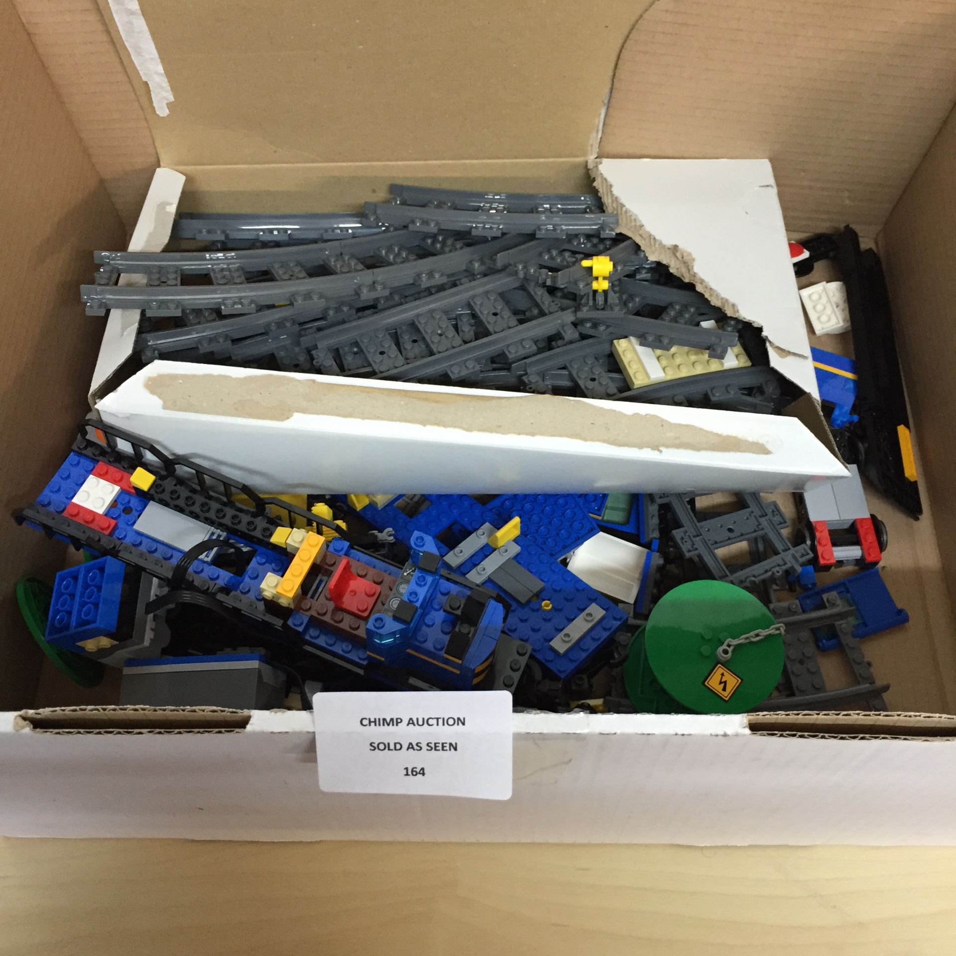 BOX OF LEGO ELECTRIC TRAIN SET & REMOTE UNCLAIMED PROPERTY