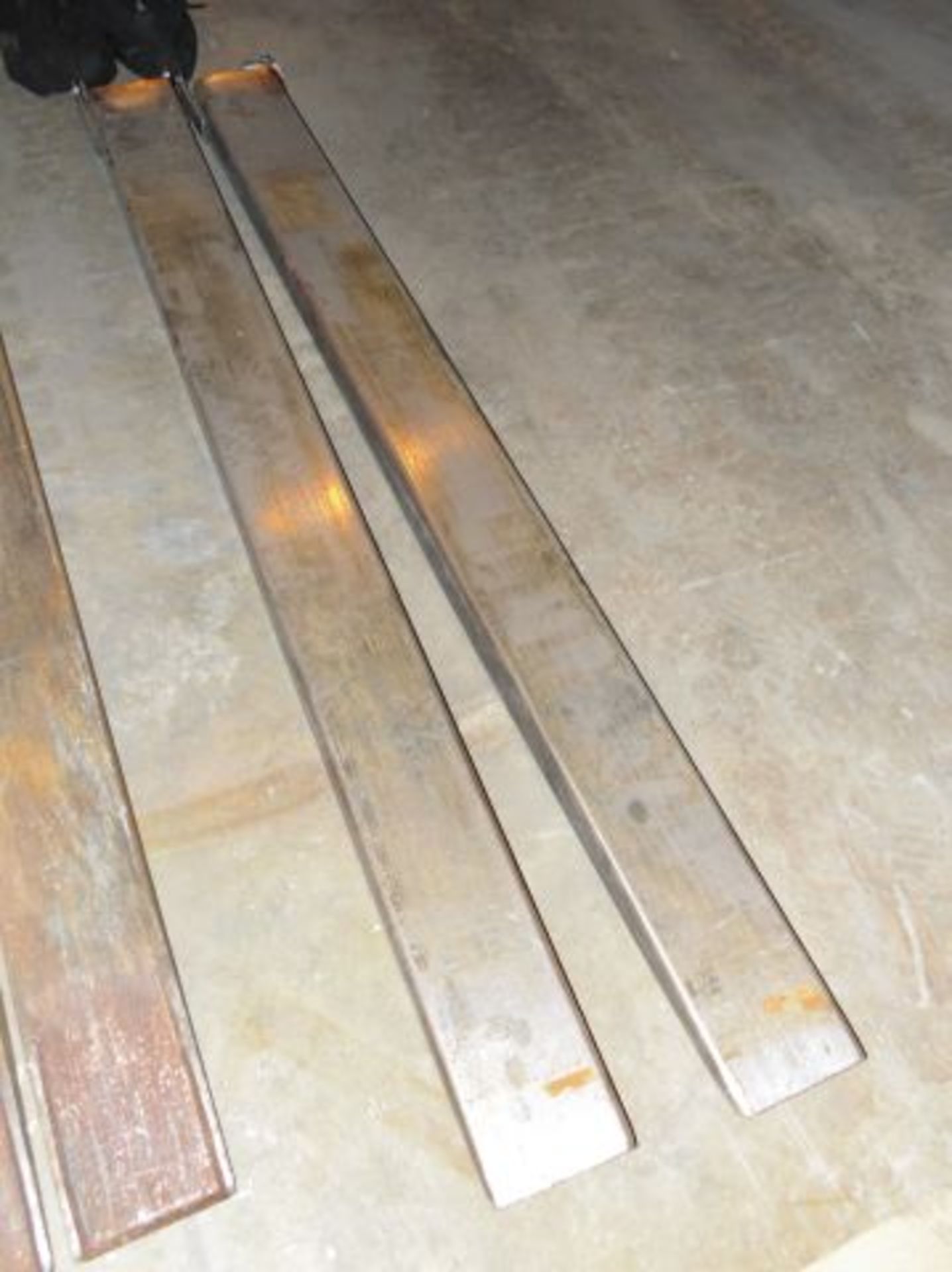 * Pair of Forklift Extension Tines; Length 2200mm; Width 1700mm. Loaded onto Buyer's Transport