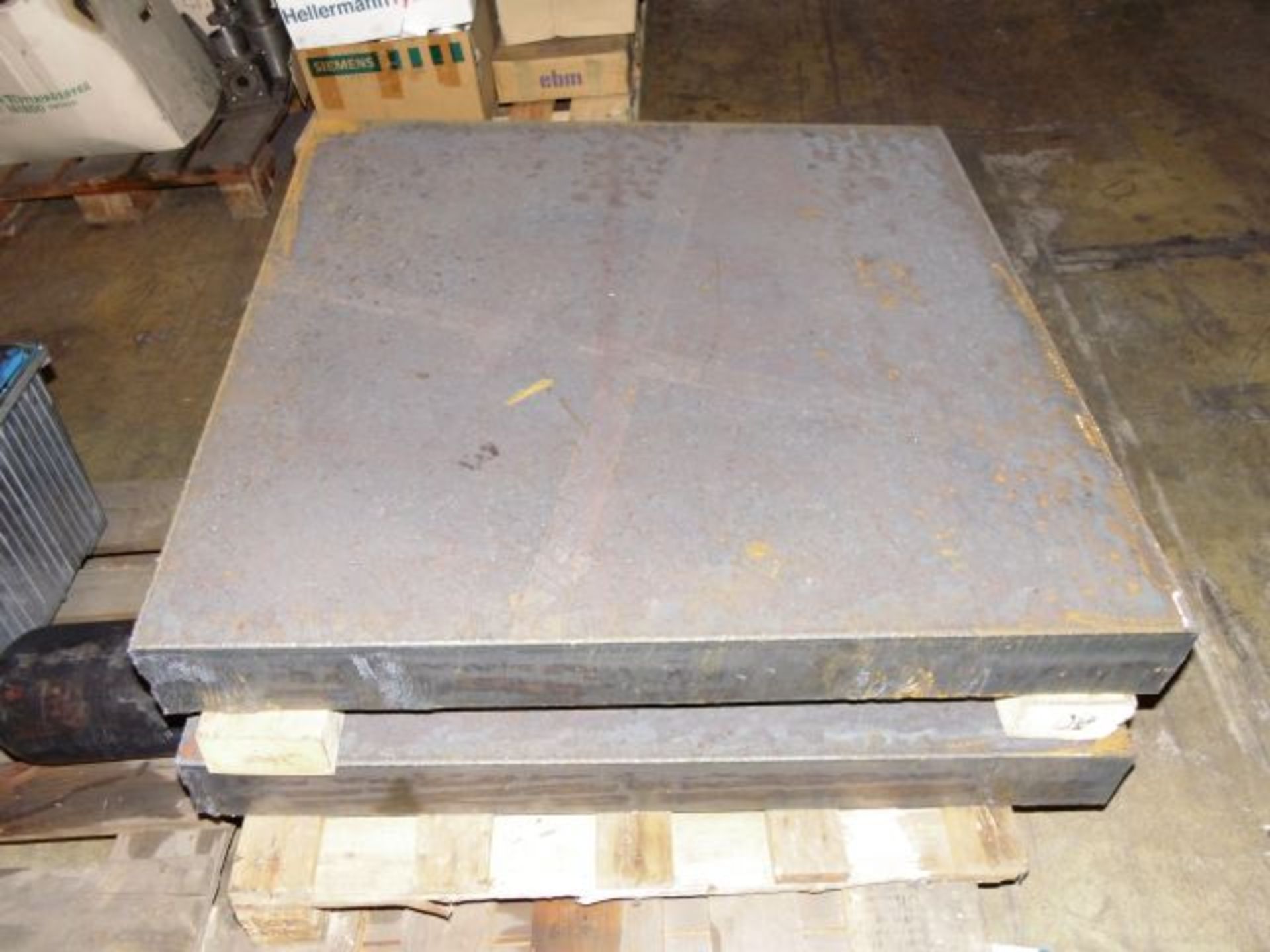 * 2 x Large Square Steel Slabs; each 950mm x 950mm x 100mm. Loaded onto Buyer's Transport