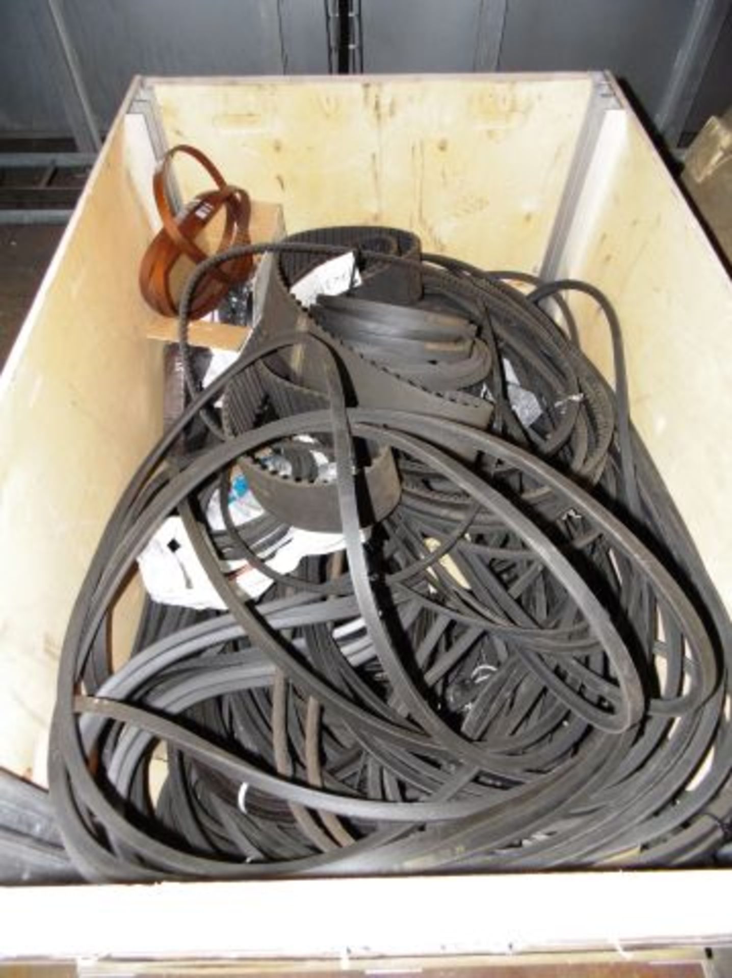 * Stillage of assorted Rubber Belts. Loaded onto Buyer's Transport