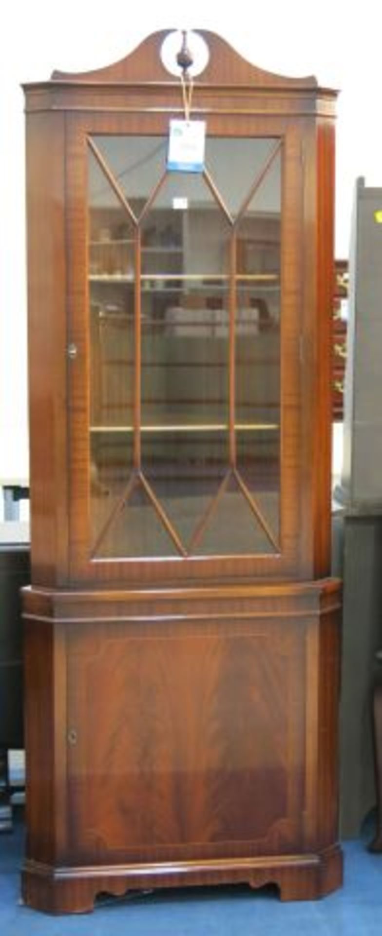 A Lockable Double Door Drinks Cabinet together with a Corner Cabinet with Lockable Lower Shelved