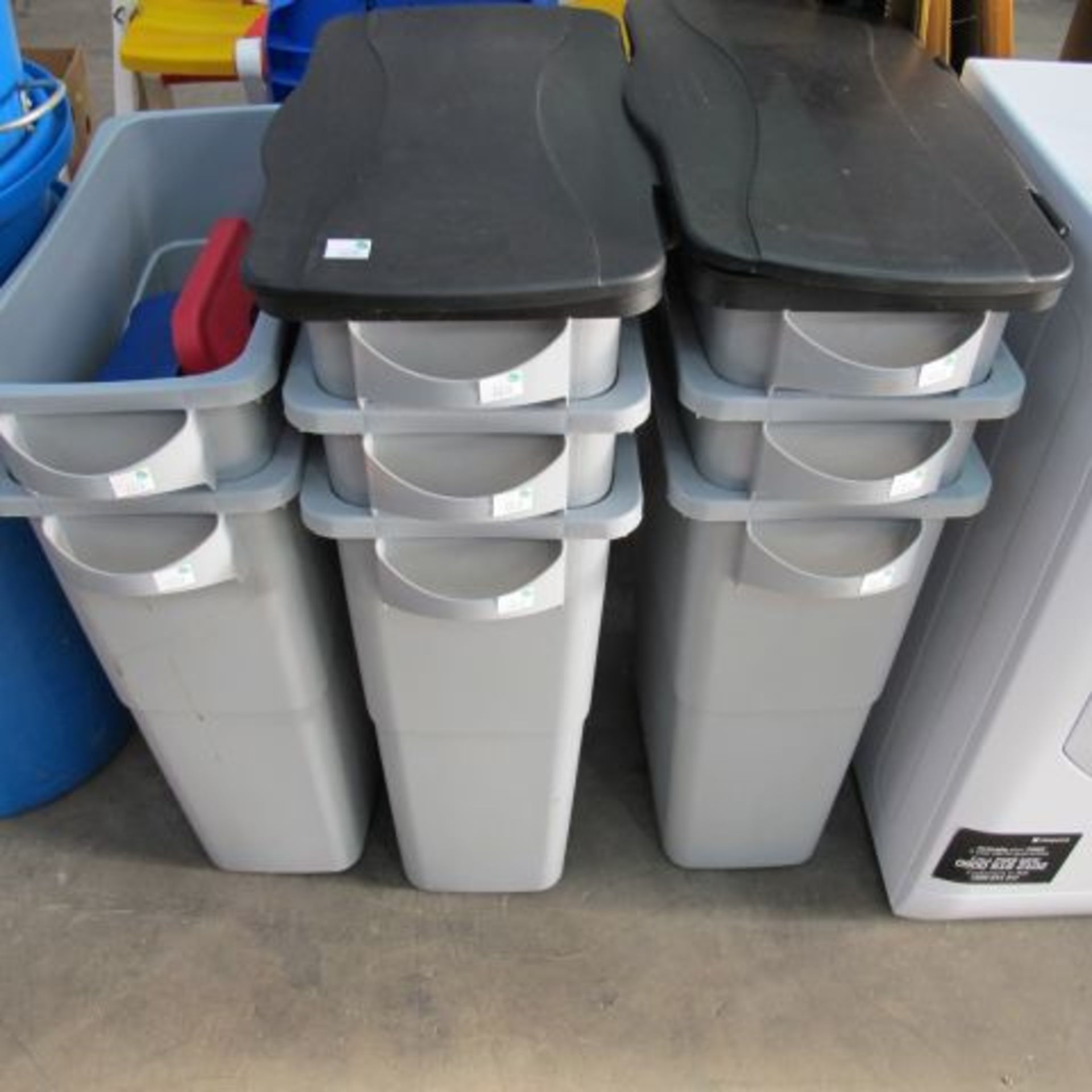 * Eight Grey Rubbermaid Waste/Recycling Bins. Two fitted with hinged black lids, three blue 'flip'