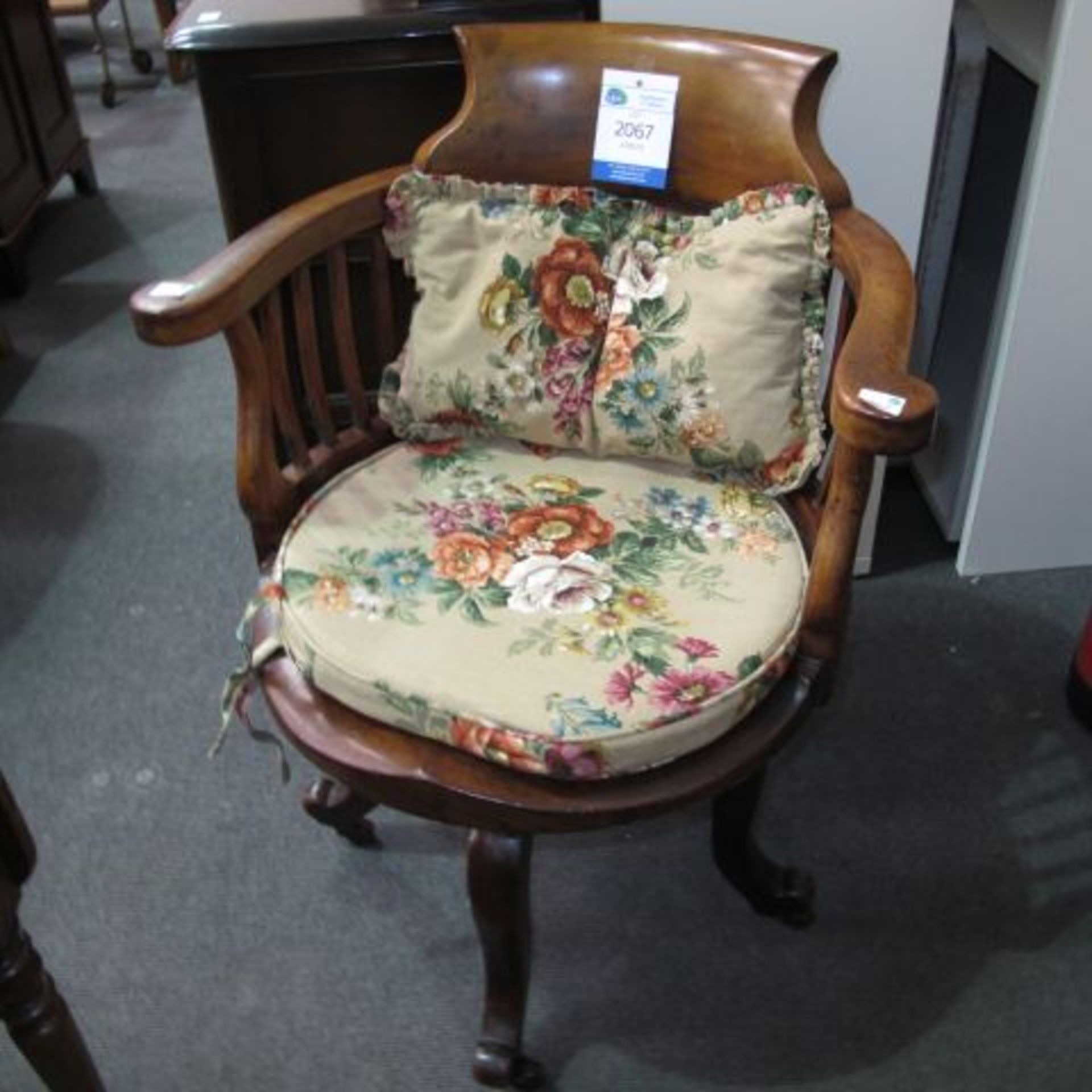 A Swivel Mahogany Captains Chairs with fabric covered Cushions and Castors (est. £50-£80)