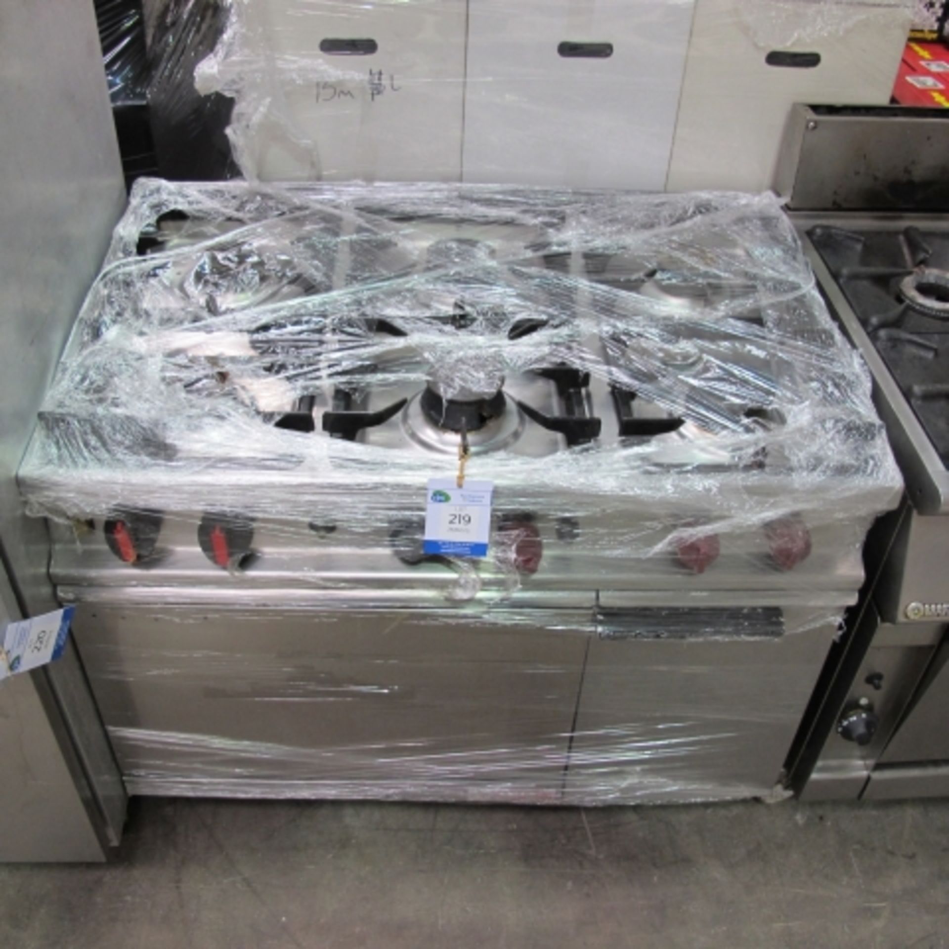 * Stainless Steel Commercial Gas Cooking Range with Six-Burner Hob.  Please note there is a £5