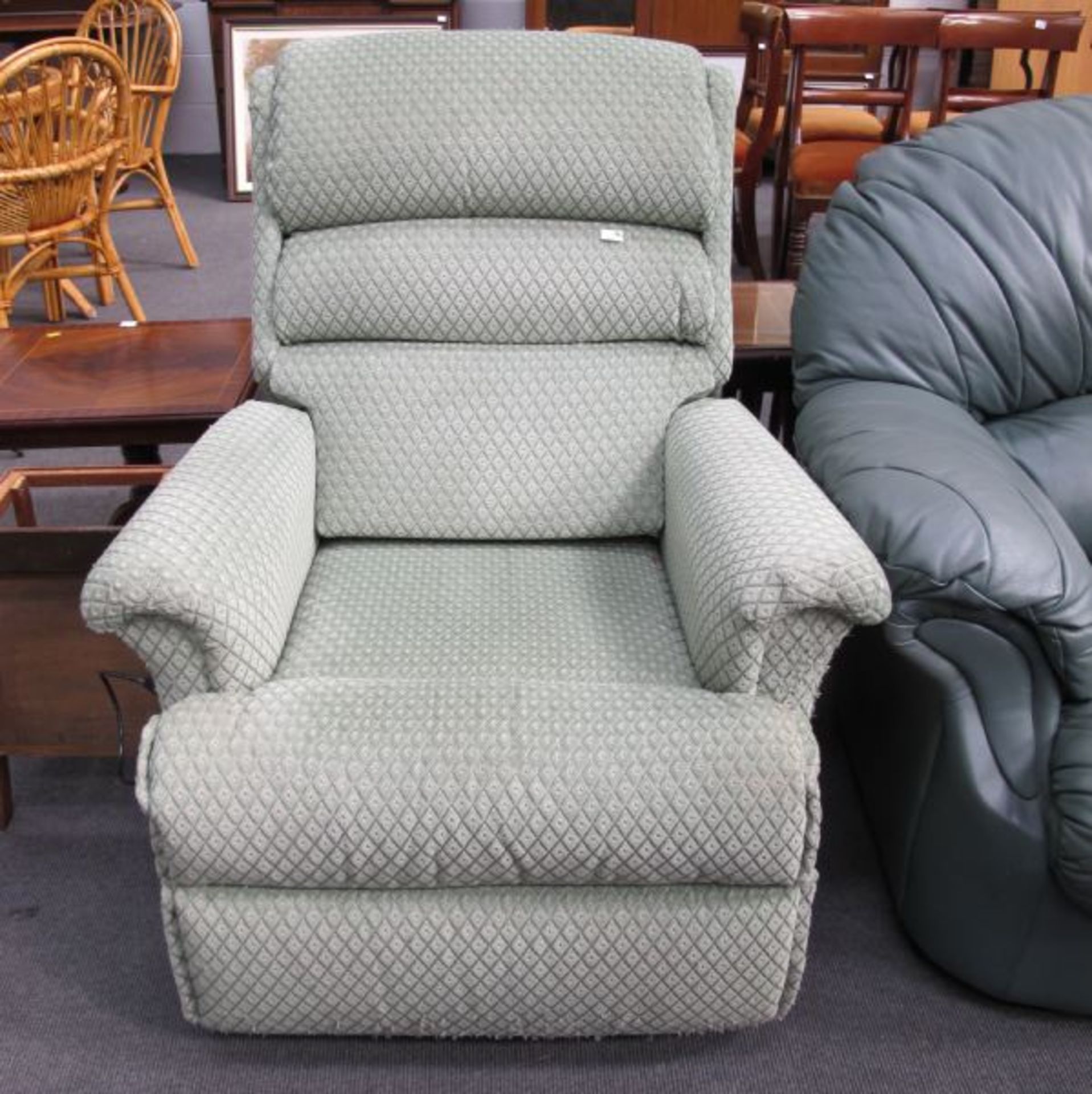 A Green Upholstered Electrically Operated Armchair, spares or repair (est. £50-£100)