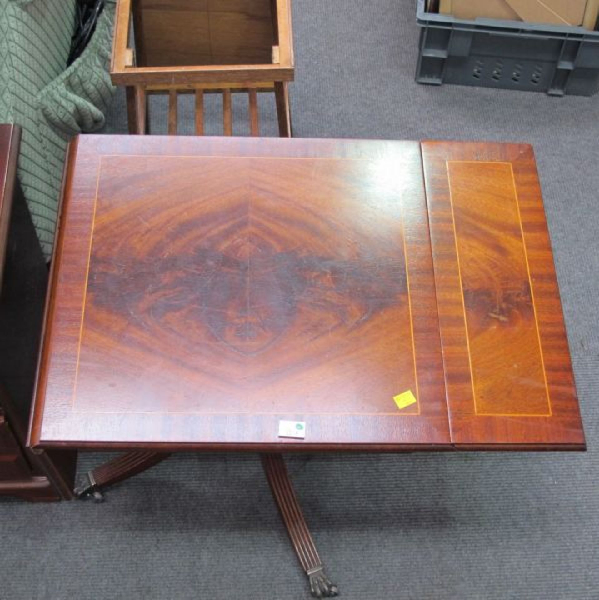 A Nest of Three Leather Top Coffee Tables; a Mahogany Three Drawer Bedside Chest and a Mahogany