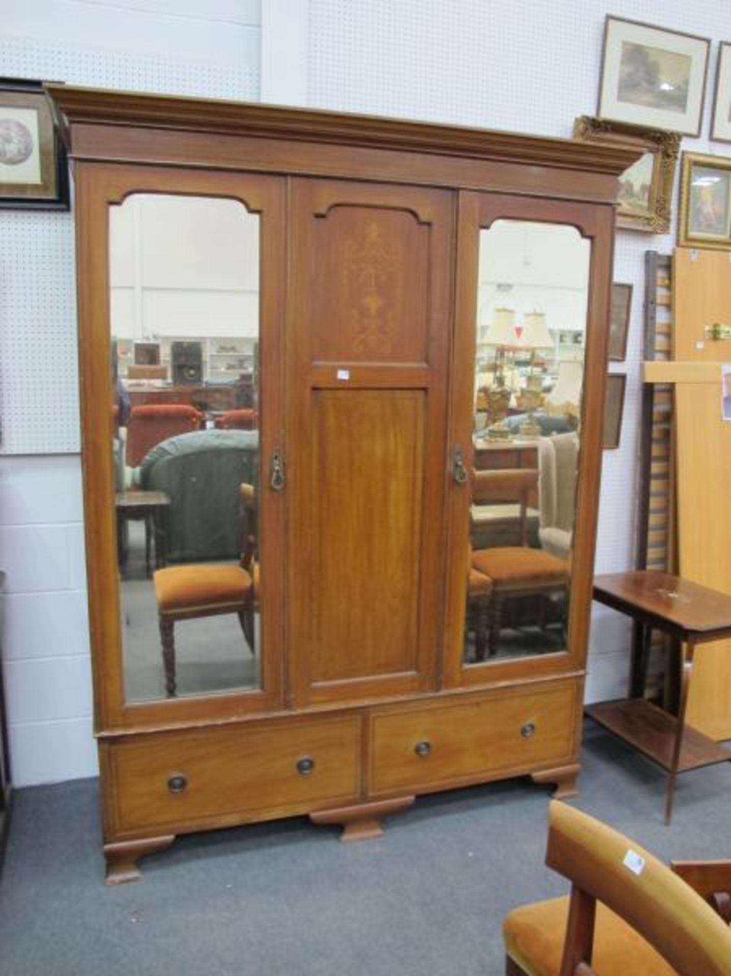 An Edwardian Inlaid Mahogany Triple Wardrobe with Two-Mirrored Doors and Two Drawers to the Base.