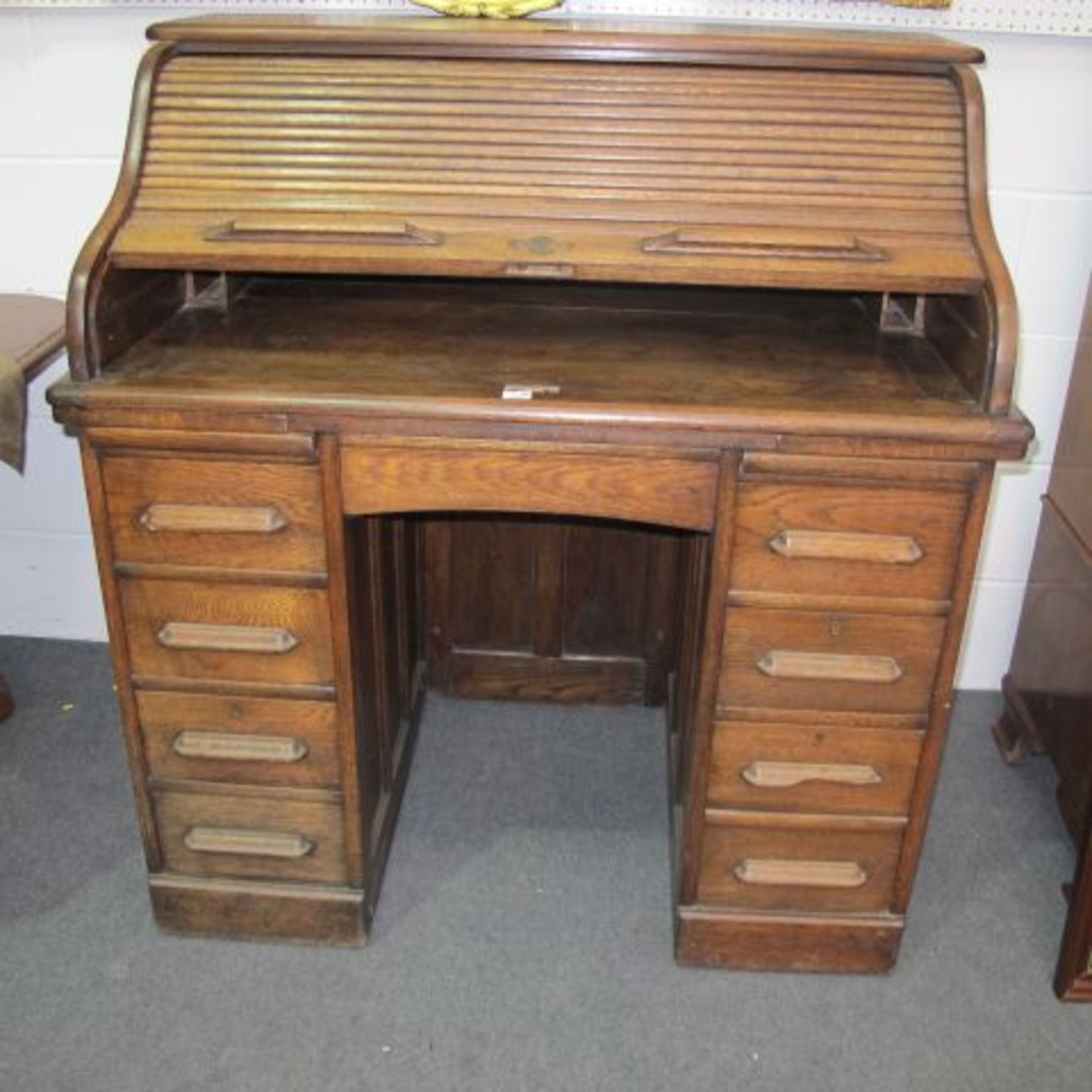 An Early C20th. Oak Small Roll-Top Desk with S-Shaped Tambour over Two Floor Drawer Pedestals.
