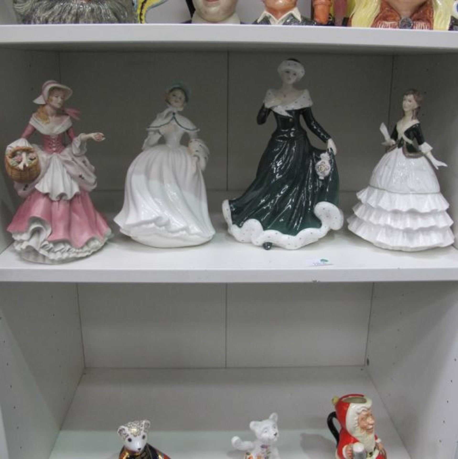 Four figurines of Ladies - Royal Worcester Debutane; Royal Doulton Wintertime and Jessica together