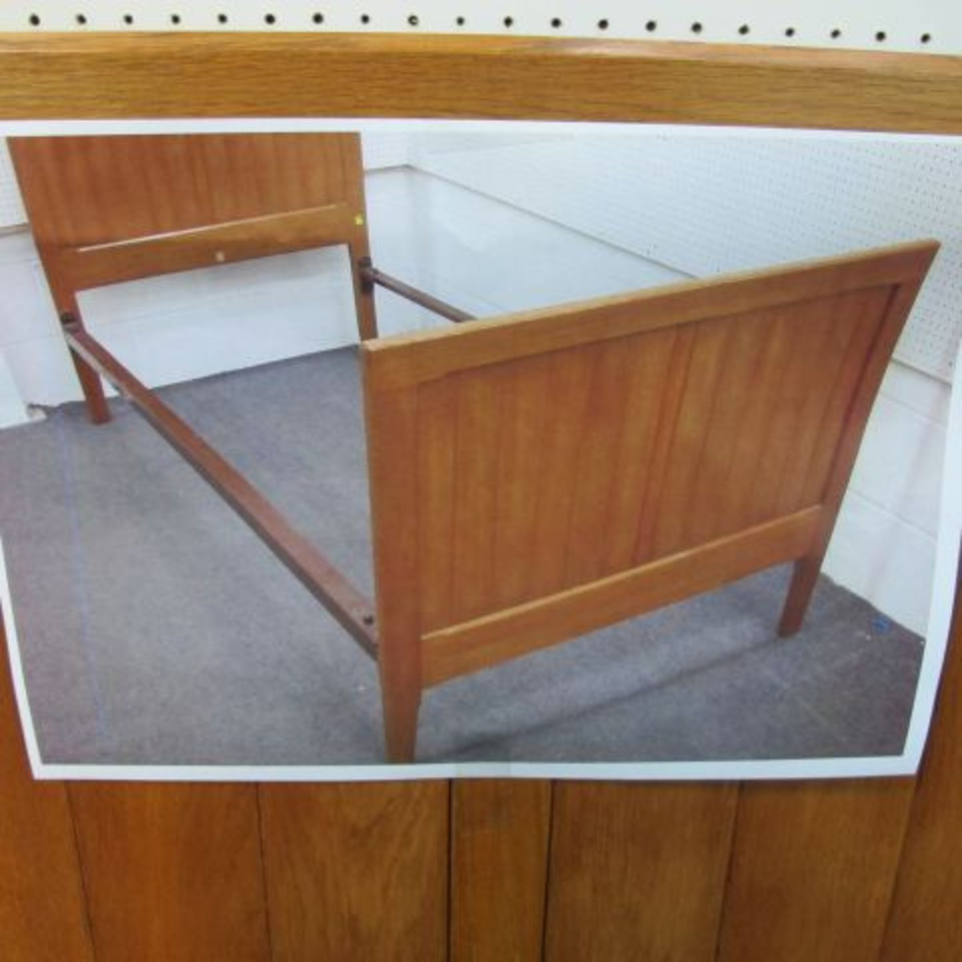 A Plain Panelled Oak Single Bed Frame.  (est. £10-£20)