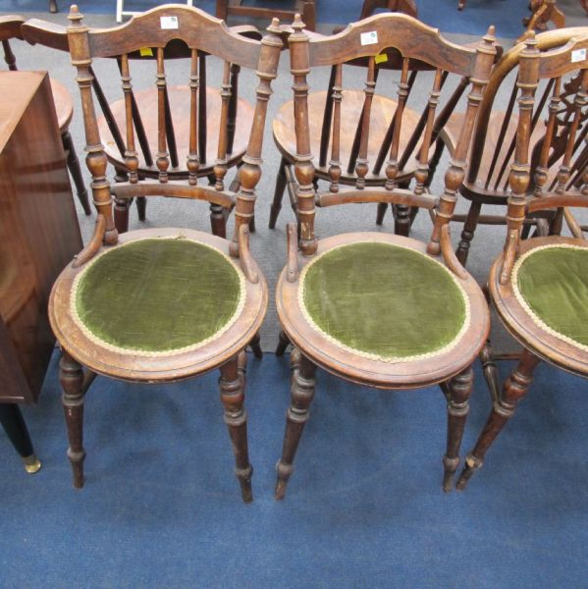 A Set of Three Late Victorian Ornate Spindle Back Single Chairs; An Edwardian Nursing Chair and a