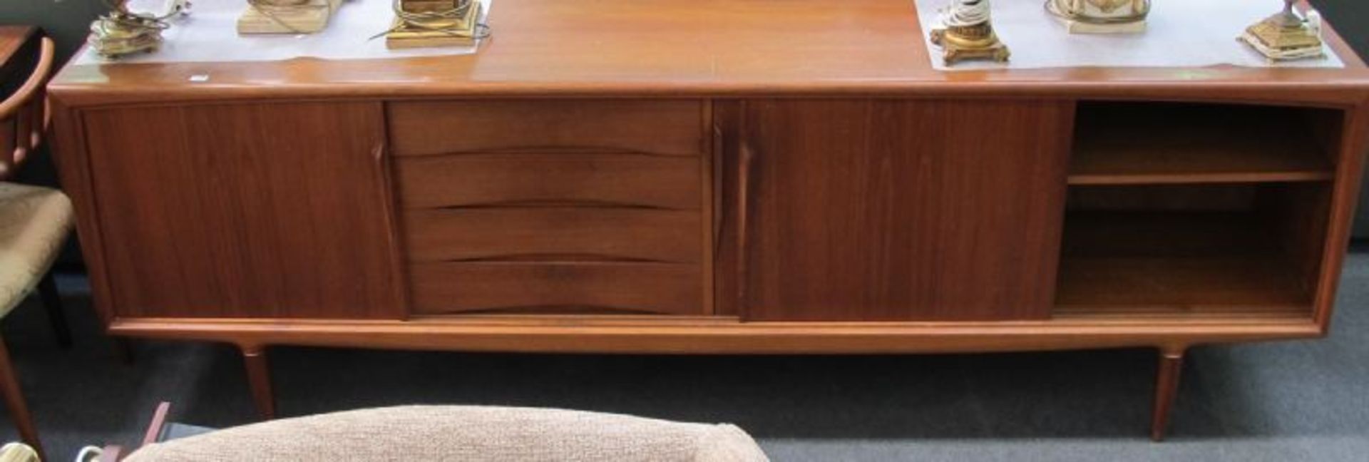 A 1970s Retro Teak Dining Suite Comprising; Long Sideboard (With Drawers and Cupboards); Extending