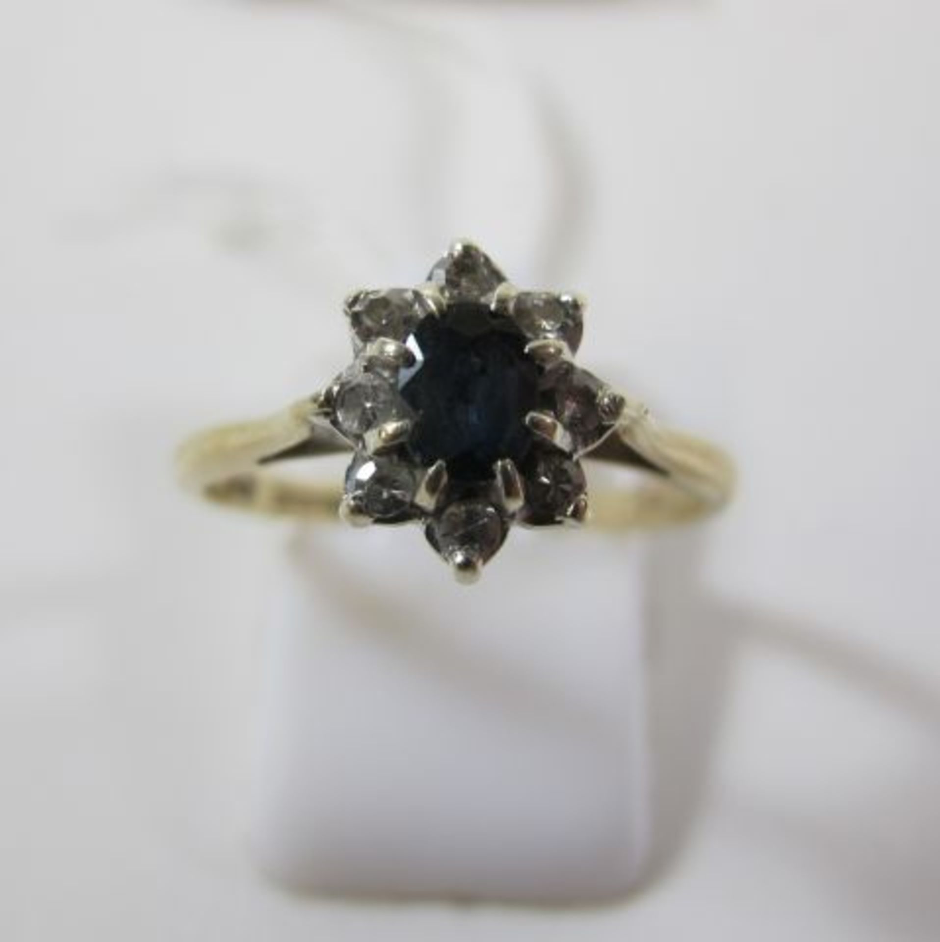 A 9ct Gold Sapphire and Diamond Ring, Size O½ (est. £40-£60)