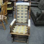 This is a Timed Online Auction on Bidspotter.co.uk, Click here to bid.  An American Rocking Armchair