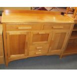 This is a Timed Online Auction on Bidspotter.co.uk, Click here to bid.  A Light Oak Sideboard with