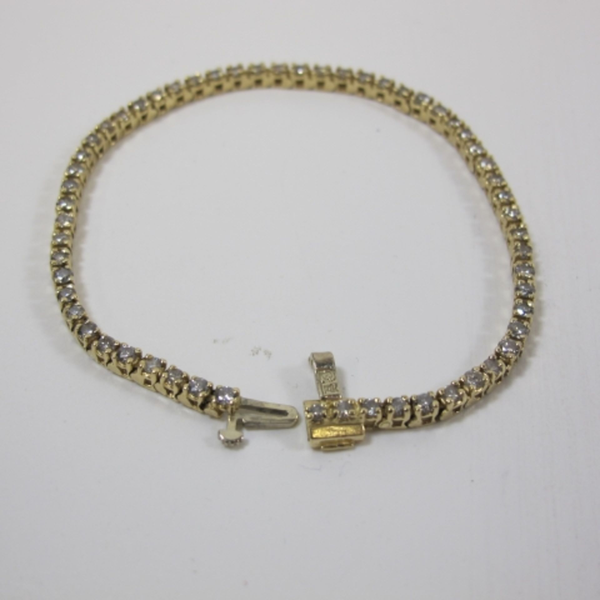 A 14K gold bracelet set with fifty eight diamonds (approximately three carats) (est. £350-£500) - Image 3 of 3