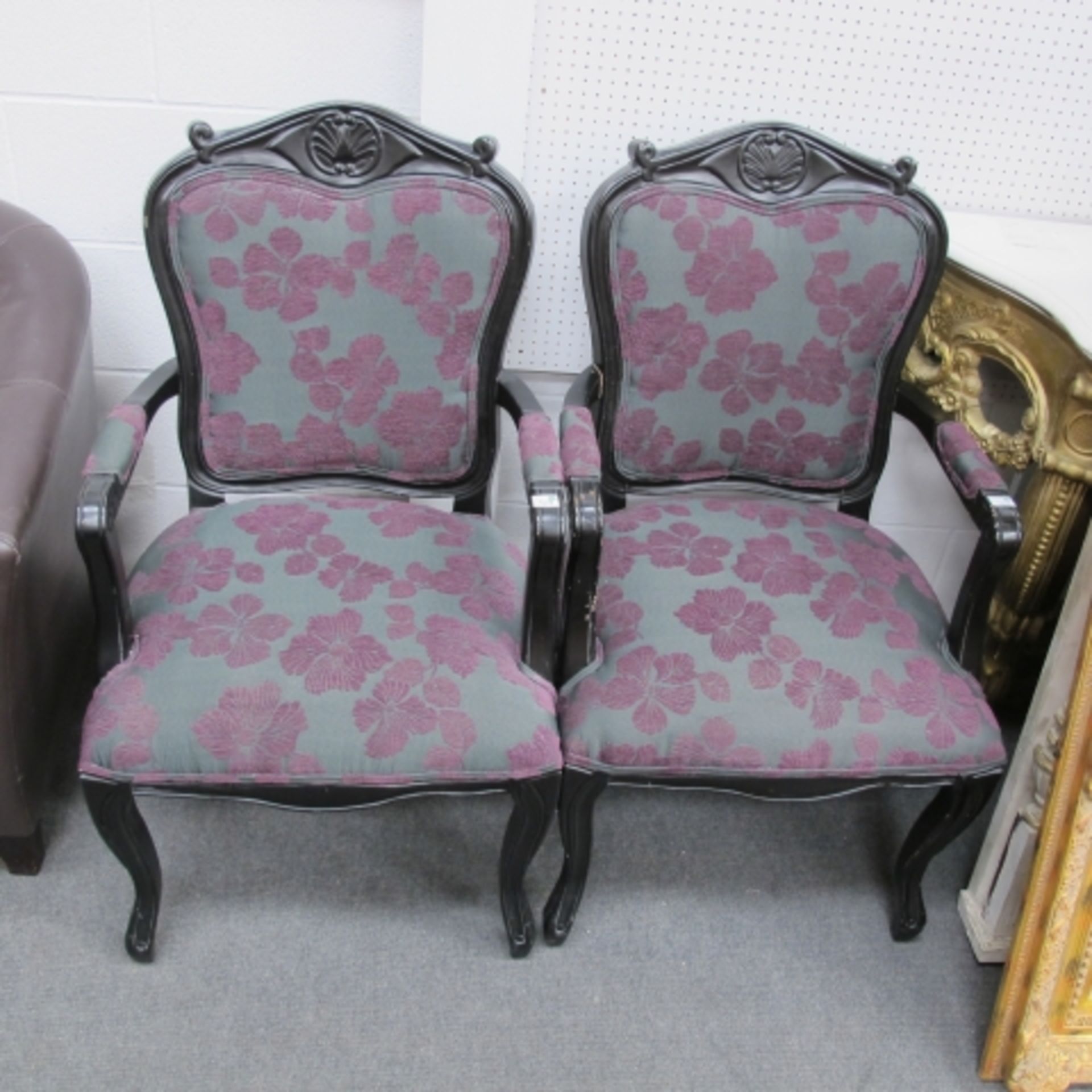 A pair of  French style black frame fauteuil (est. £20-£30)