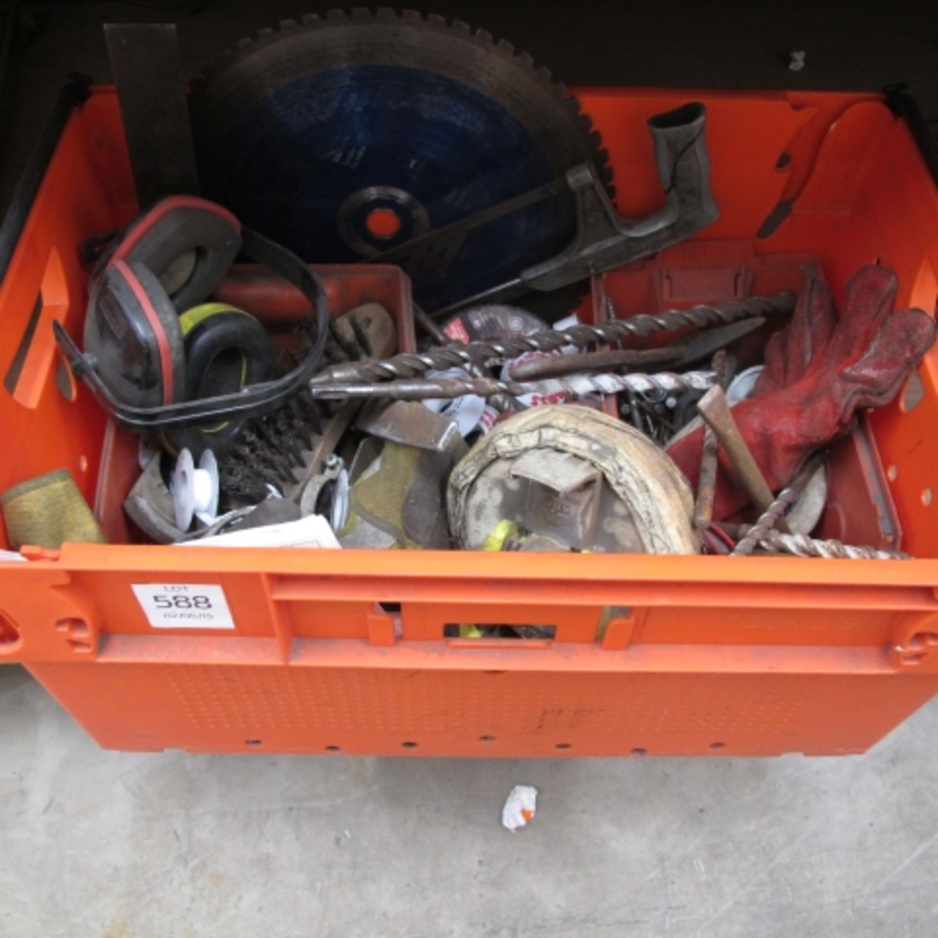 A box containing Drill Bits / Saw Blades /etc
