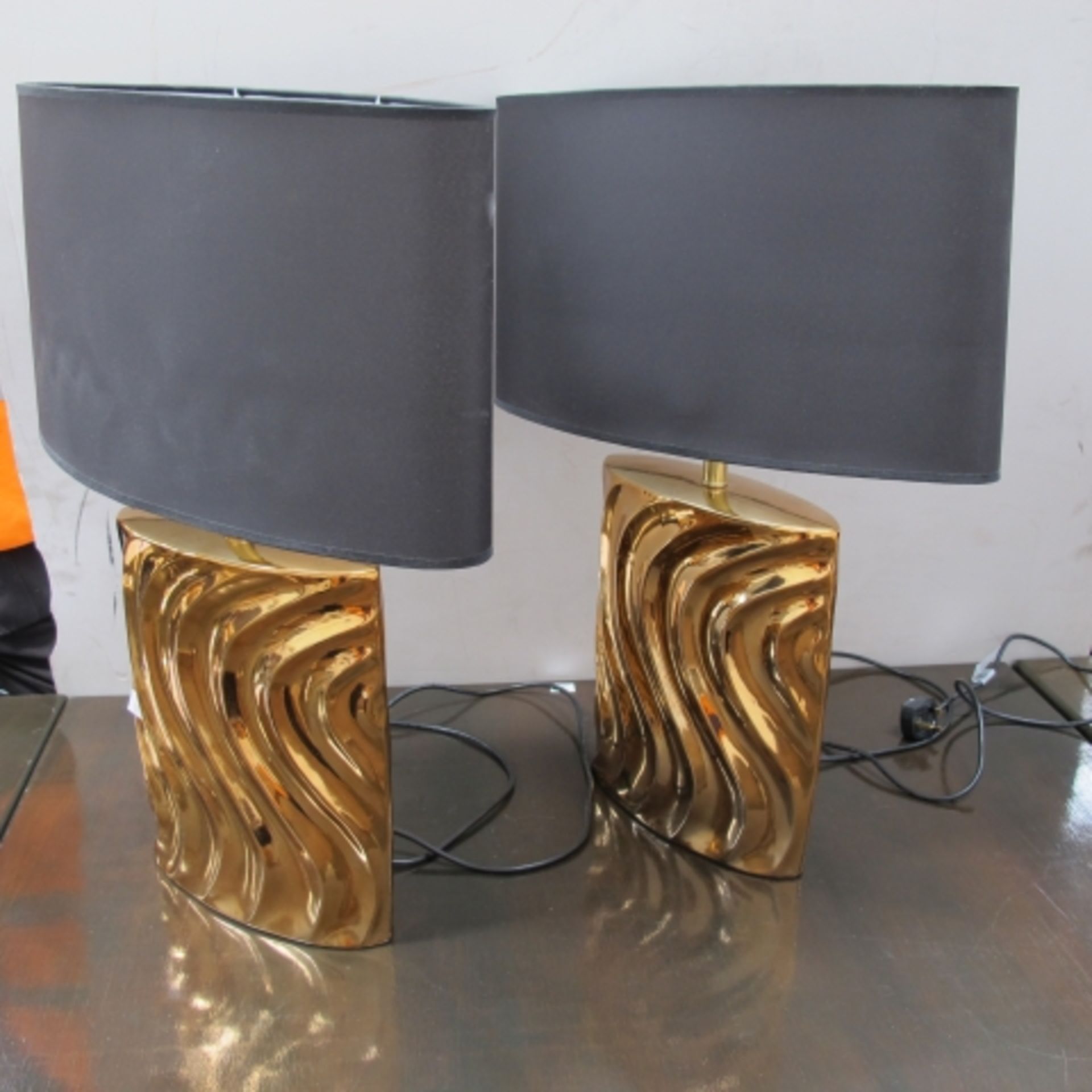 Pair of Copper finish wrythen fluted narrow oval table lamps with shades (est. £20-£30)