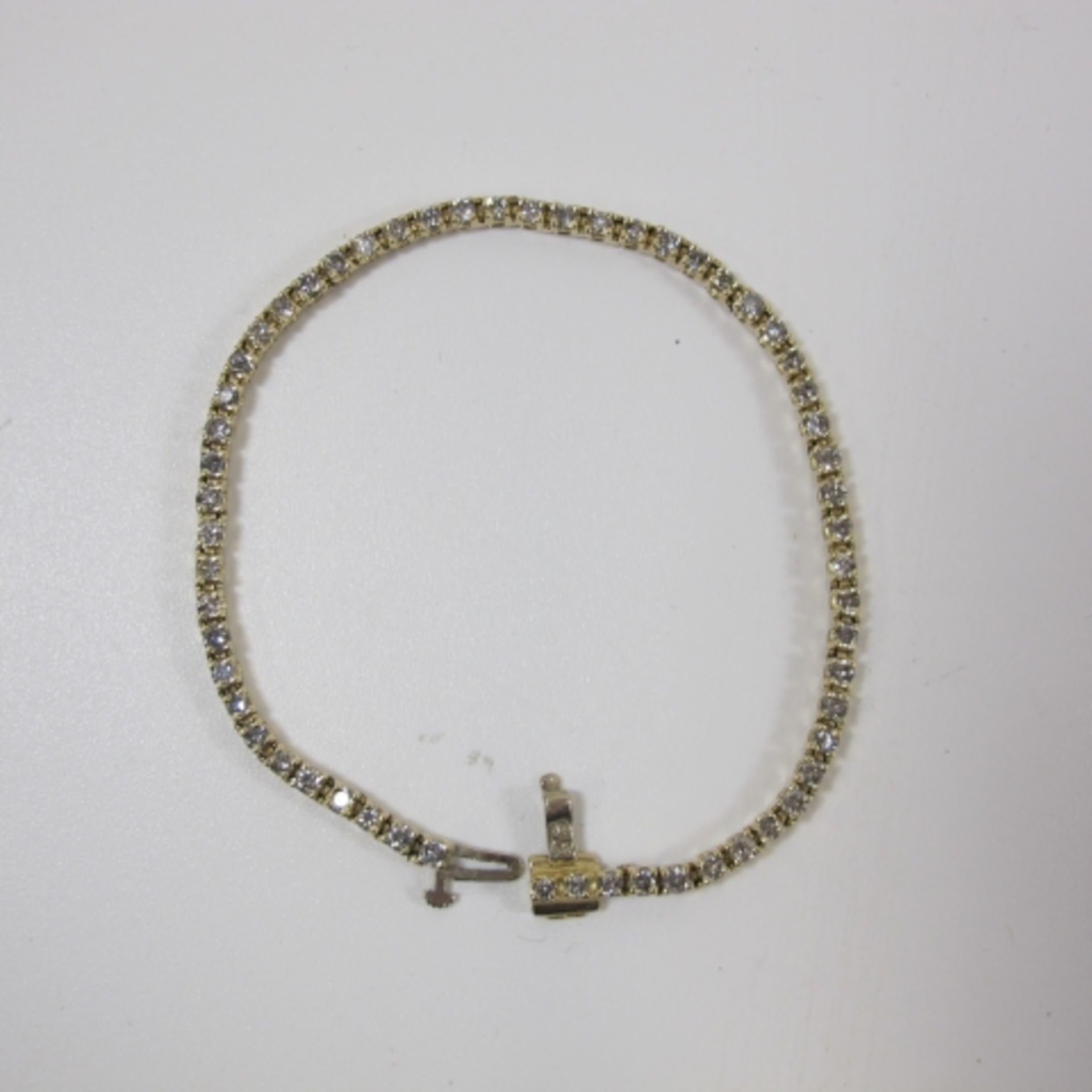 A 14K gold bracelet set with fifty eight diamonds (approximately three carats) (est. £350-£500) - Image 2 of 3