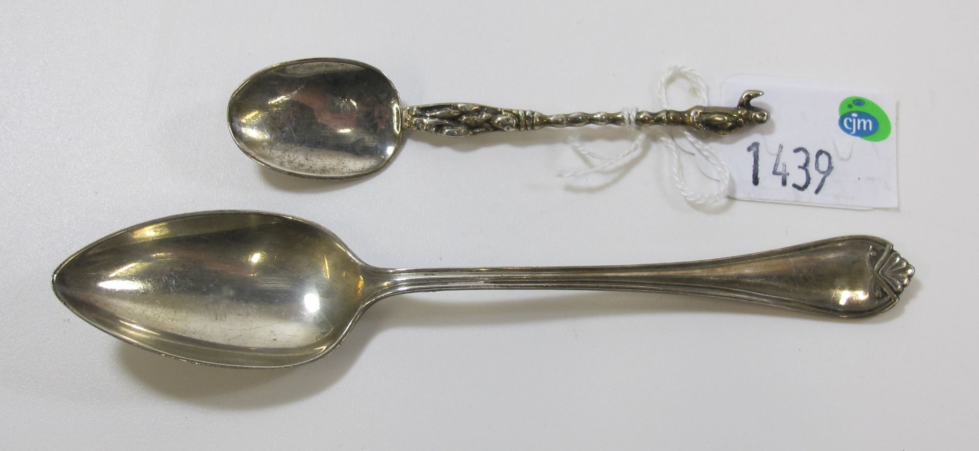 A continental silver? Apostle spoon and a sterling silver teaspoon (est. £15-£25)