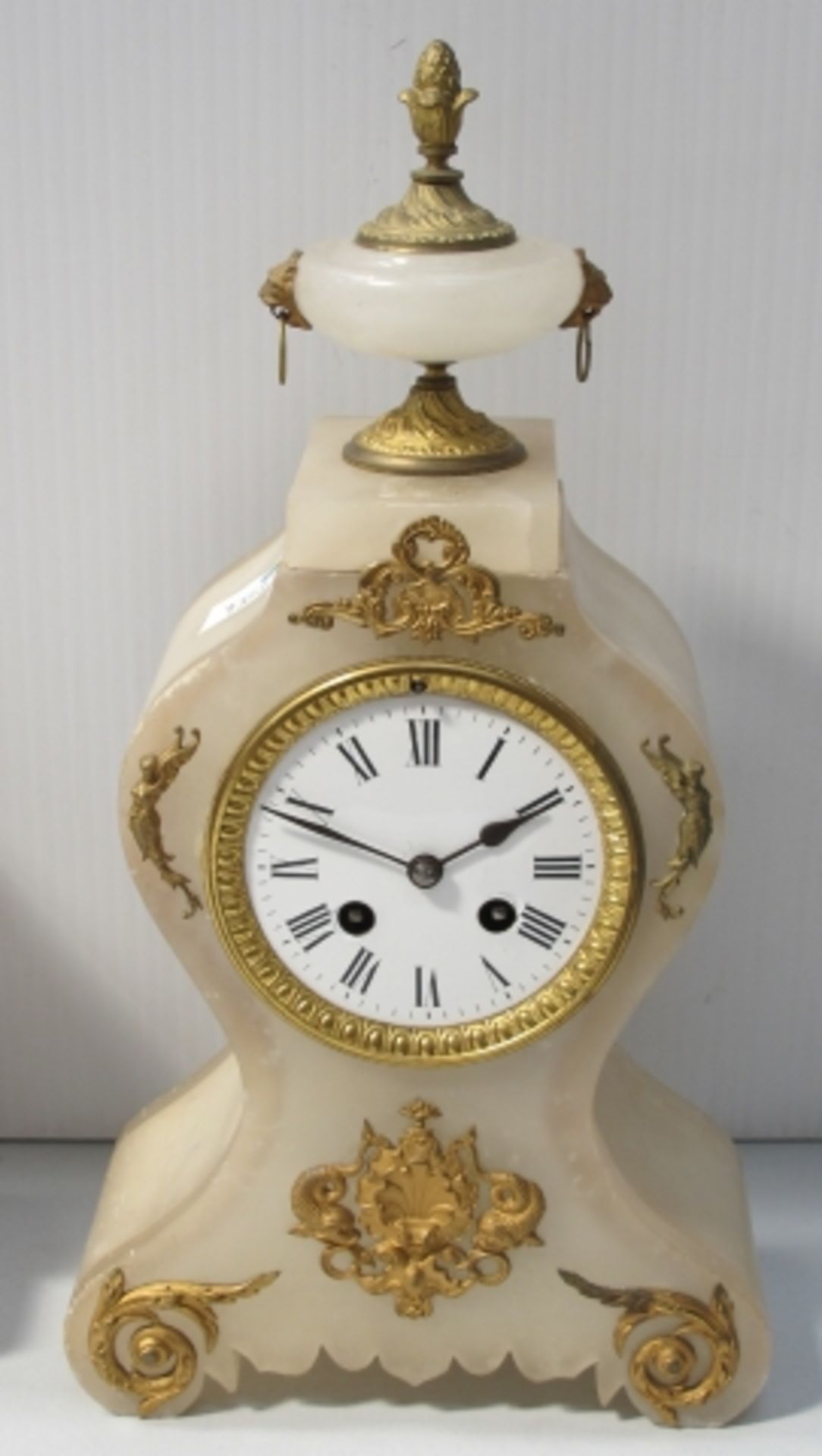 Ormolu mounted ornately shaped marble cased mantel clock 38cm high (est. £50-£80)