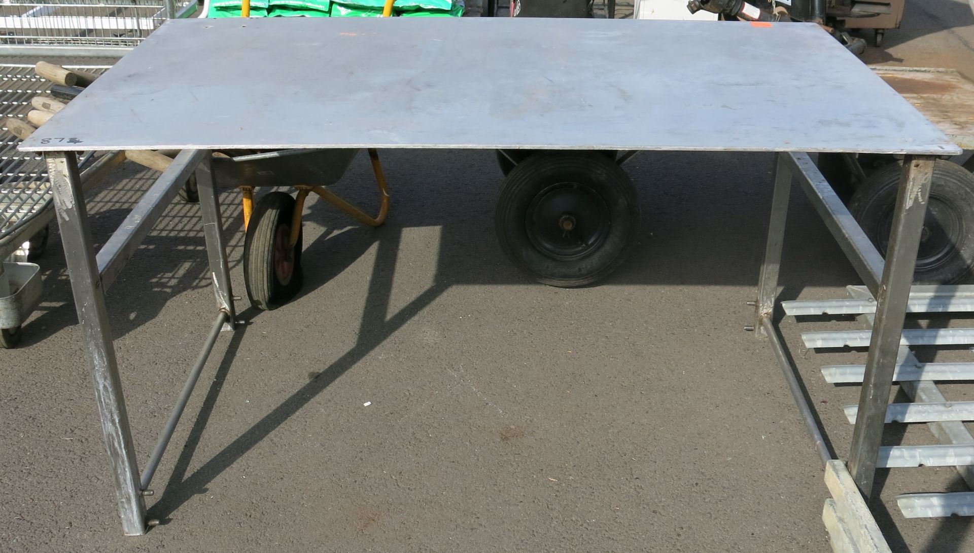 Large heavy duty stainless steel table. Please note, there is a £5 plus vat handling fee on this lot