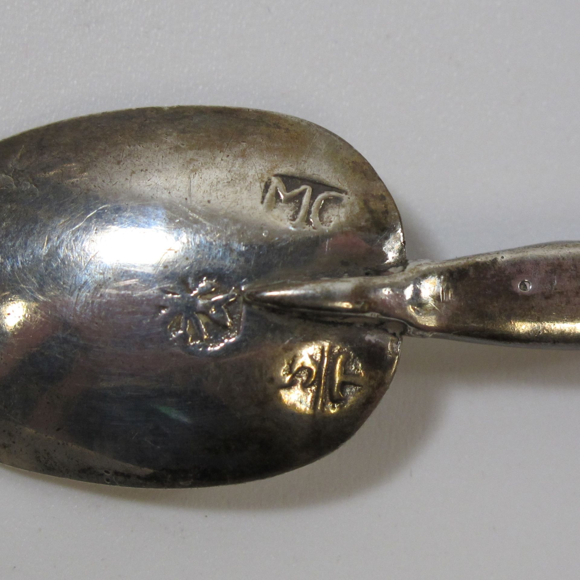 A continental silver? Apostle spoon and a sterling silver teaspoon (est. £15-£25) - Image 2 of 2