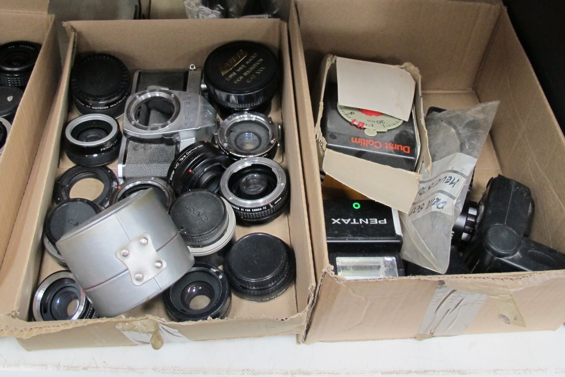4 x Boxes of assorted camera lenses etc - Image 2 of 2