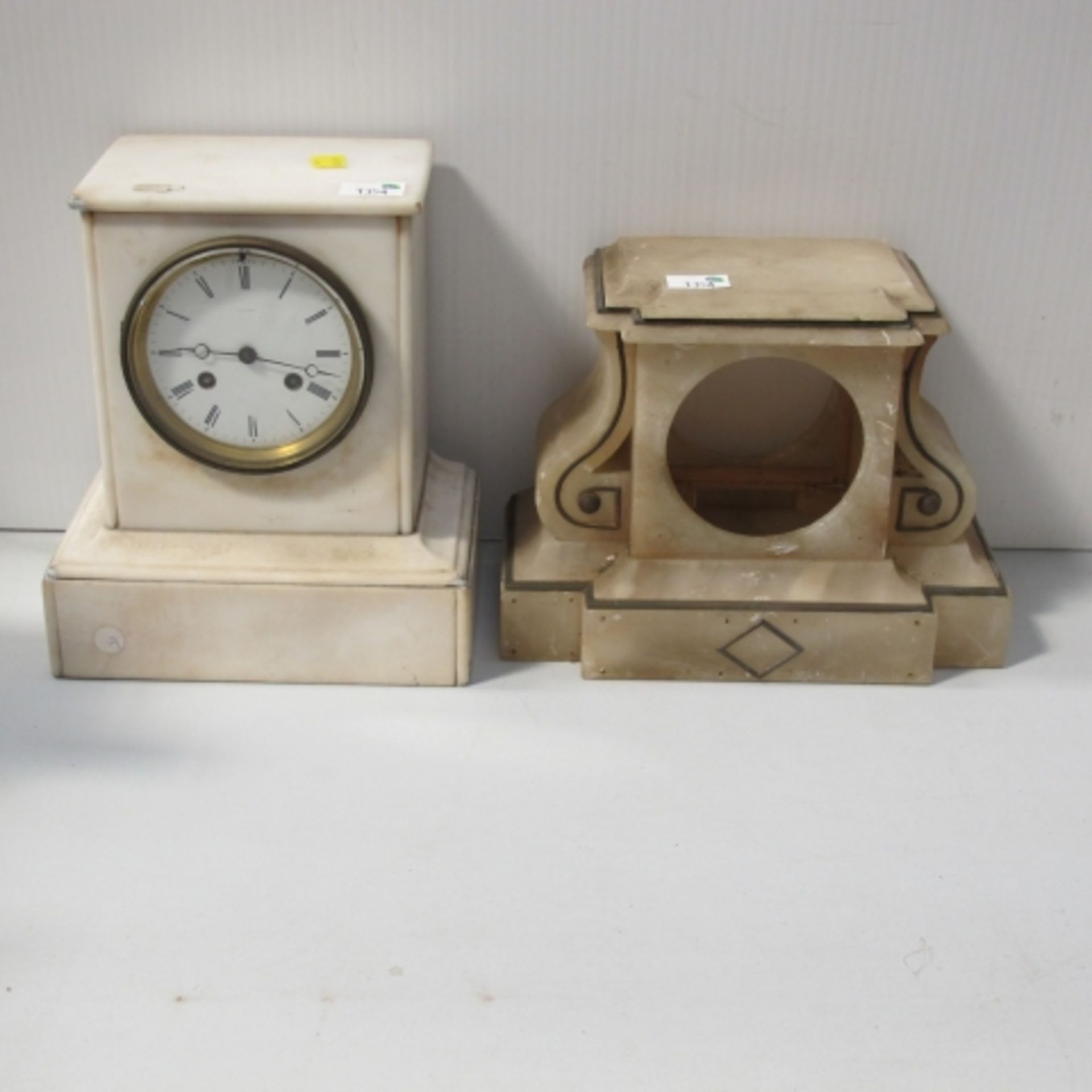 Marble cased mantel clock the dial marked 'JC Smith' 24.5cm high and a marble mantel clock case (