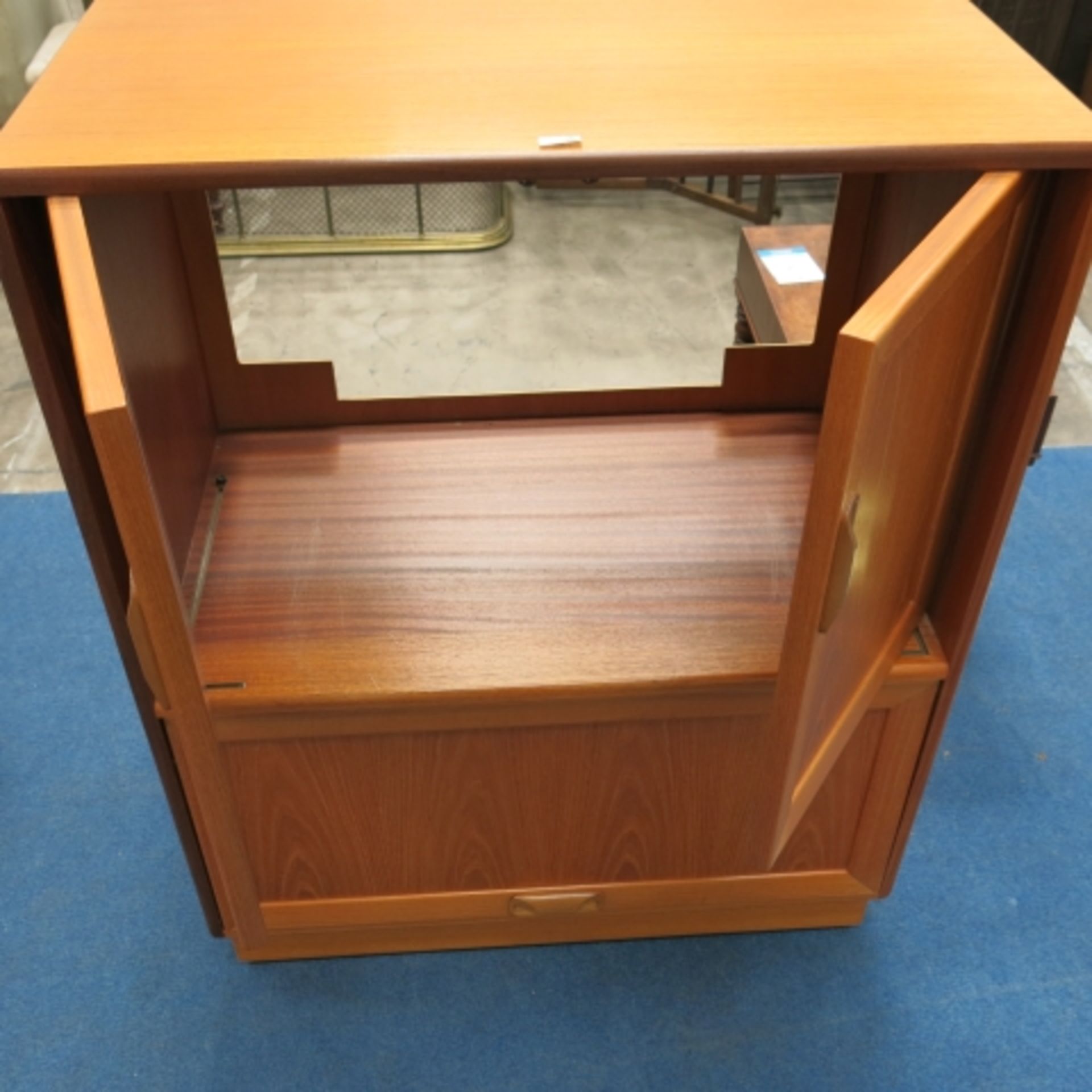 A stripped pine part dressing table, an Ercol style elm wall rack and a teak tv cabinet (3) (est. £ - Image 6 of 7