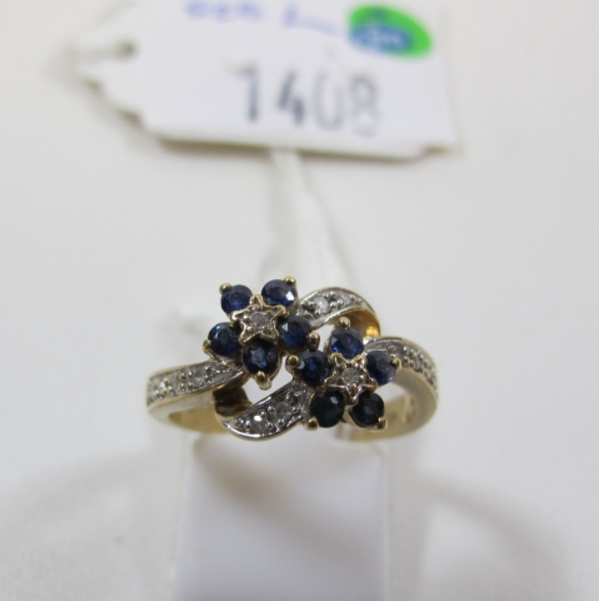 Diamond/Sapphire 9ct Gold double cluster ring. Size L (est. £70 - £90)