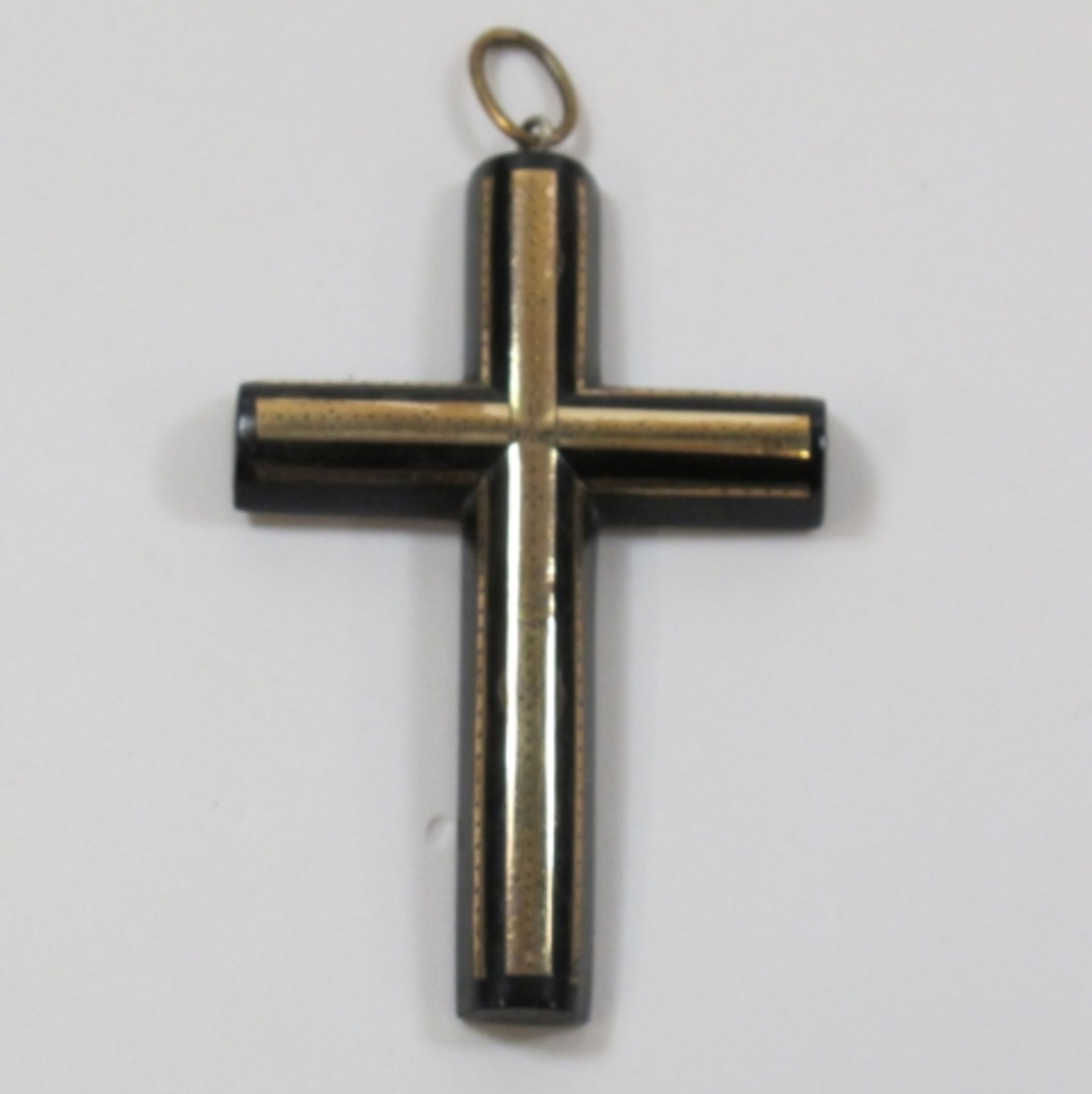 Antique (c. 1880) piquet cross (est. £25 - £50)