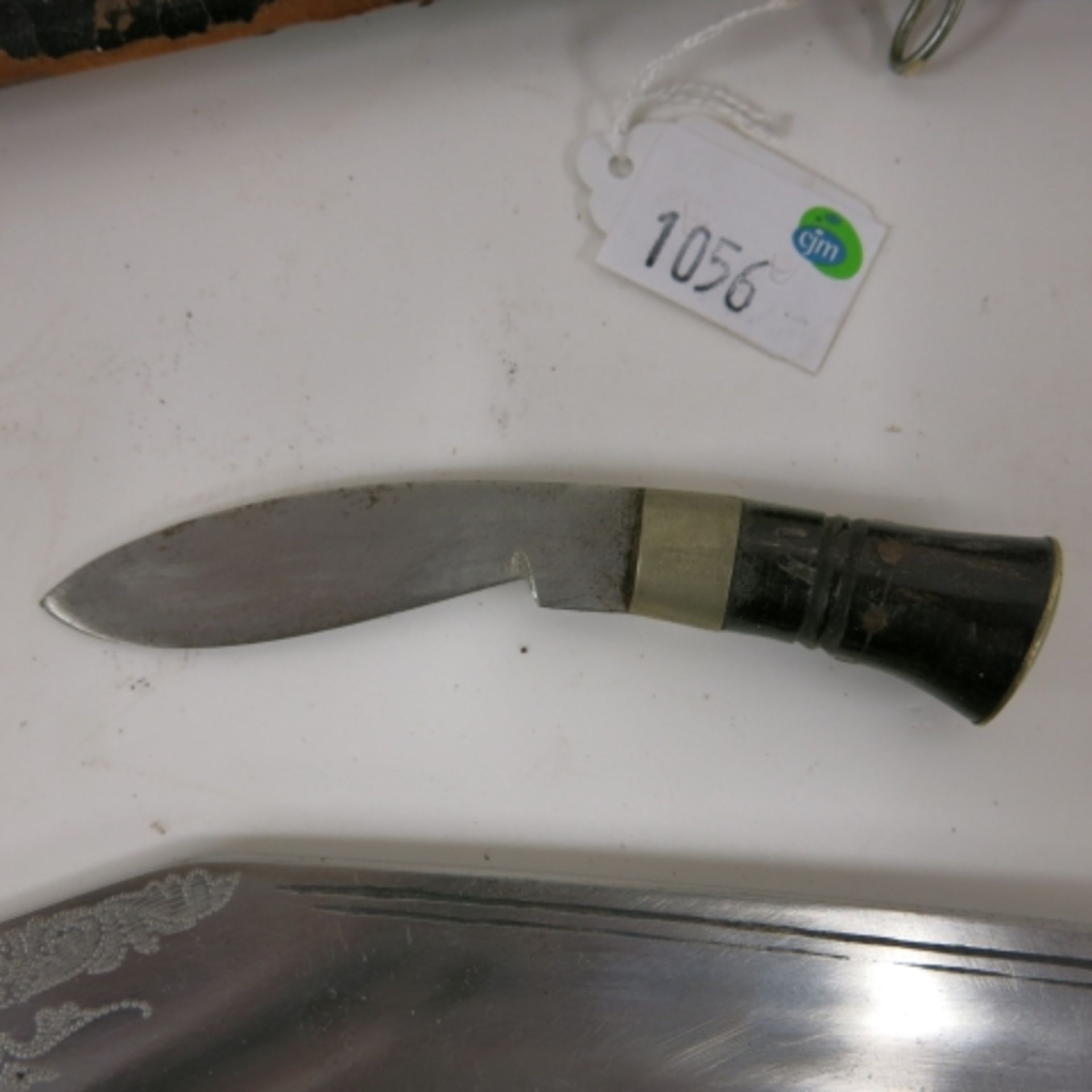 A Kukri knife with sheath and two accessory knives. Blade length 29cm (est. £50-£80) - Image 3 of 5