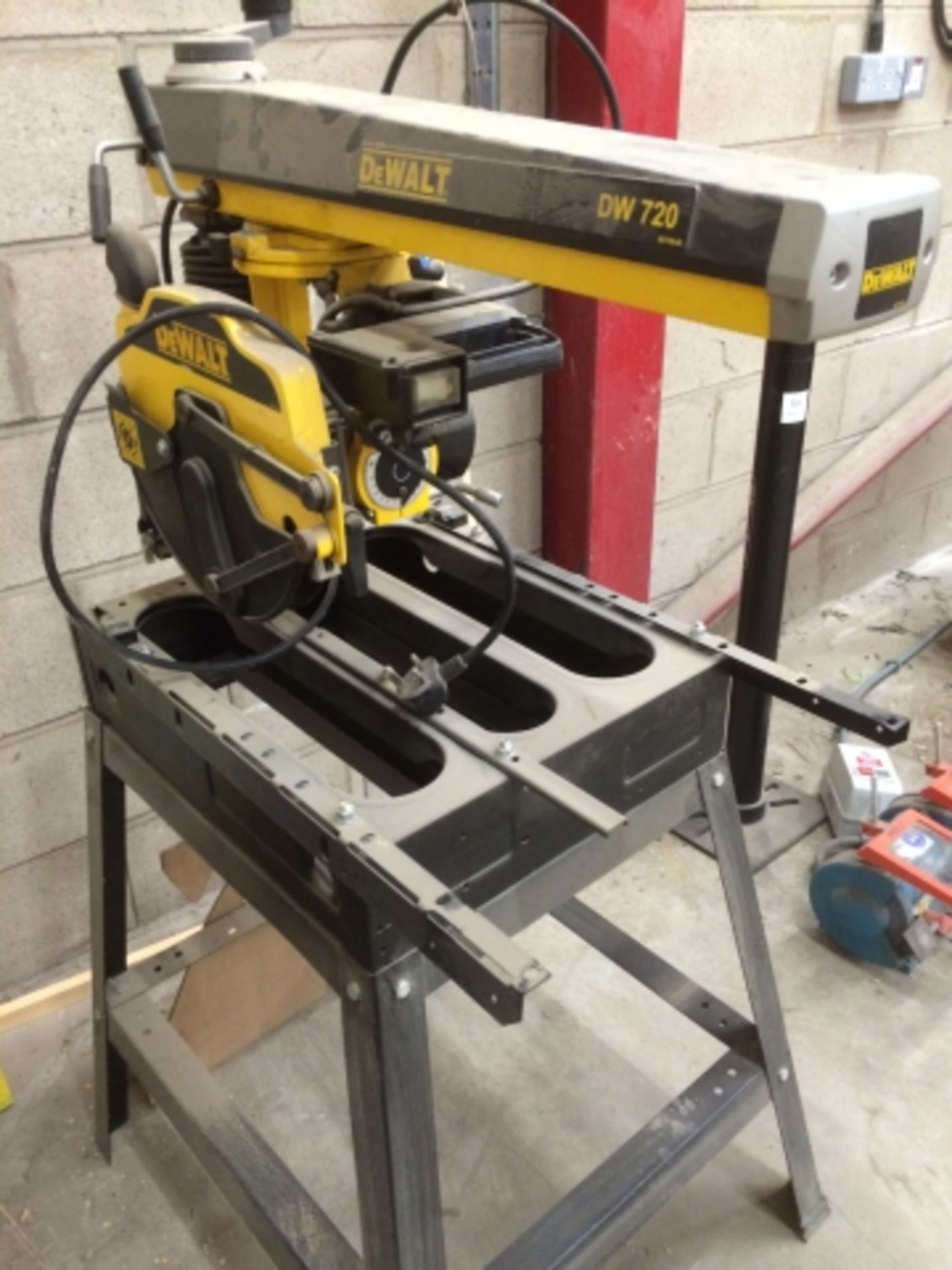 * De Walt DW720 Cross Cut Saw. Wolf Double End Bench Grinder and a Pedestal. This lot is located