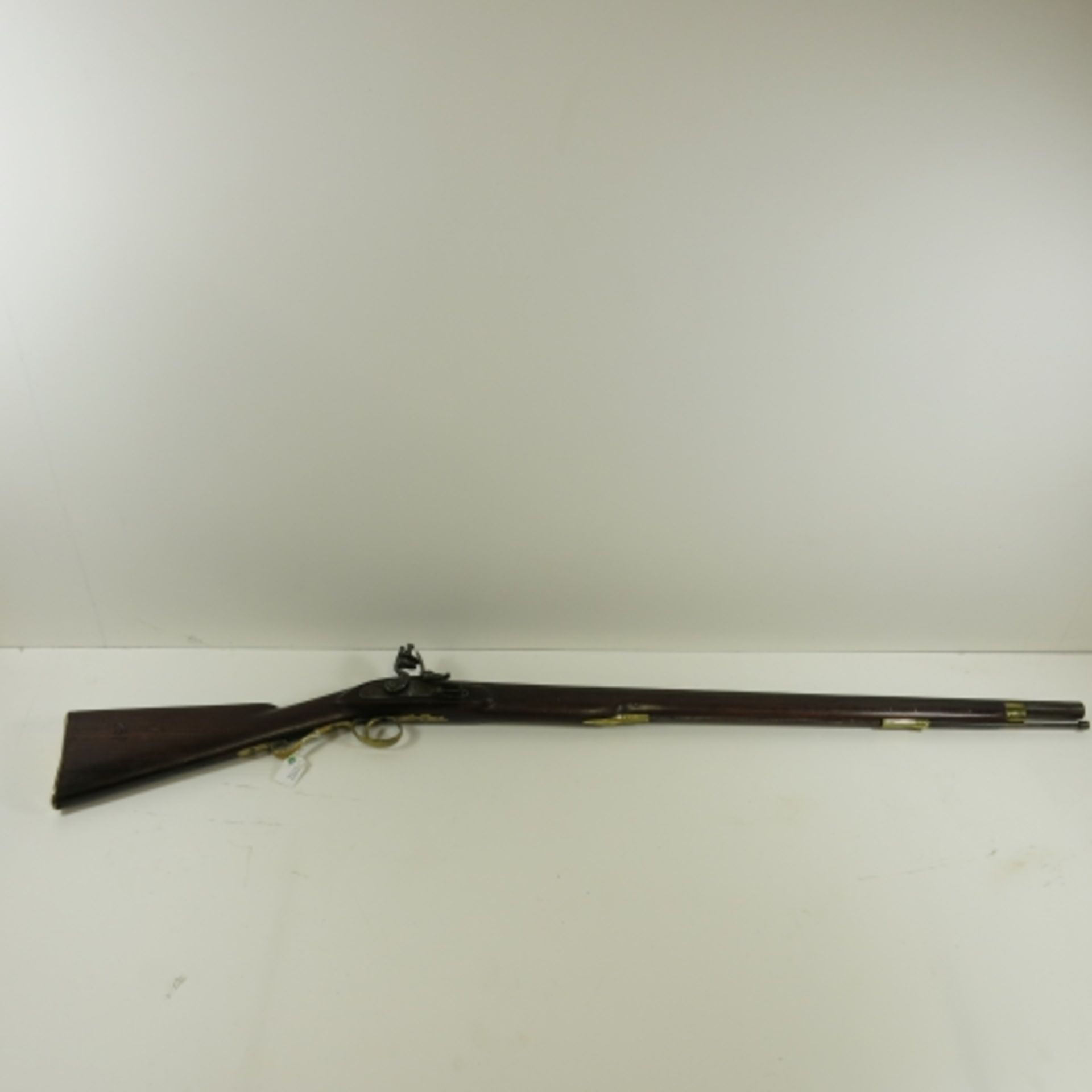 19th century Flintlock Rifle, walnut stock, stamped 250. 122cm overall length (est. £100-£200)