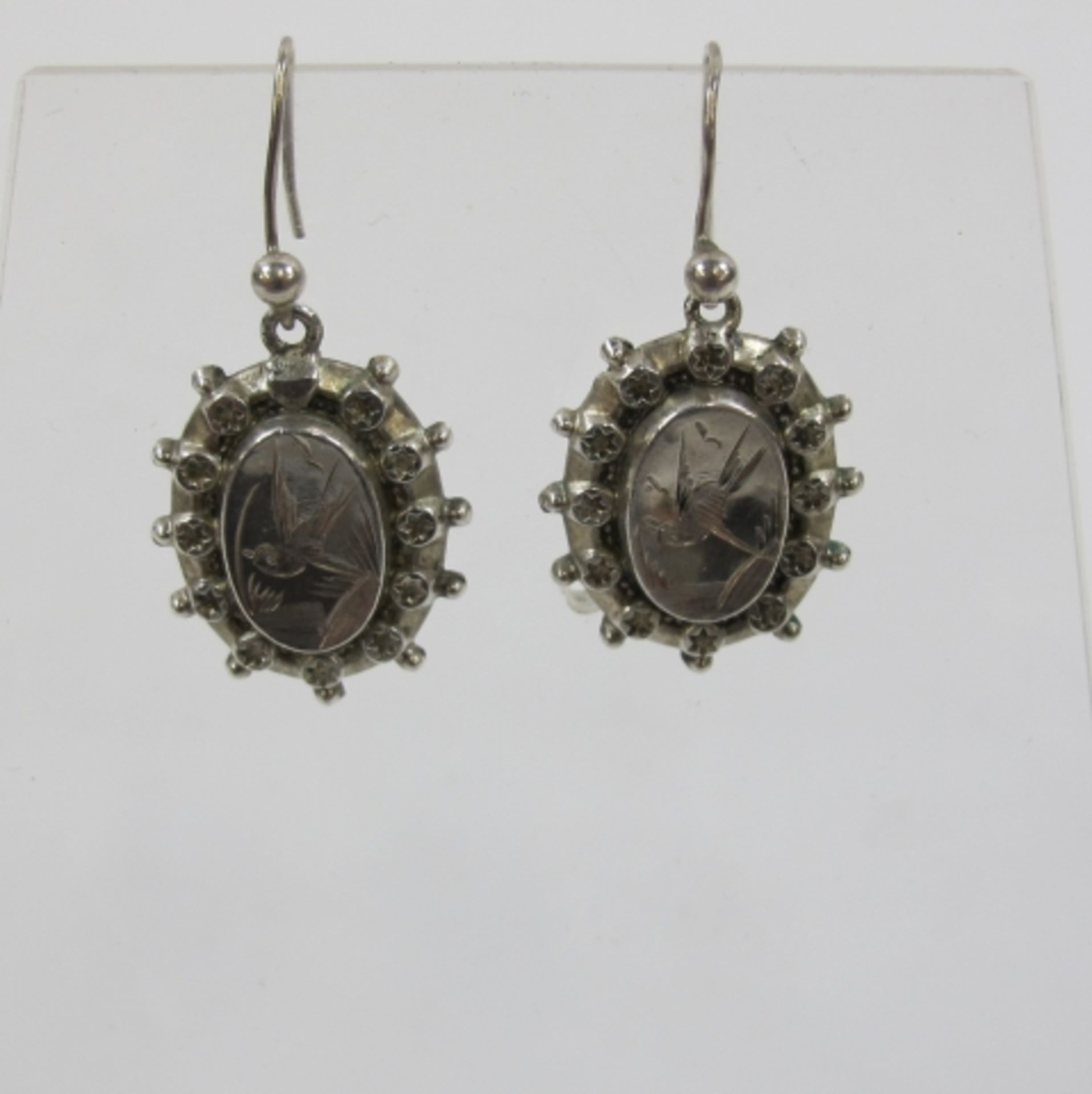 Pair of Victorian Silver (1881) aesthetic design earrings (est. £30 - £60)